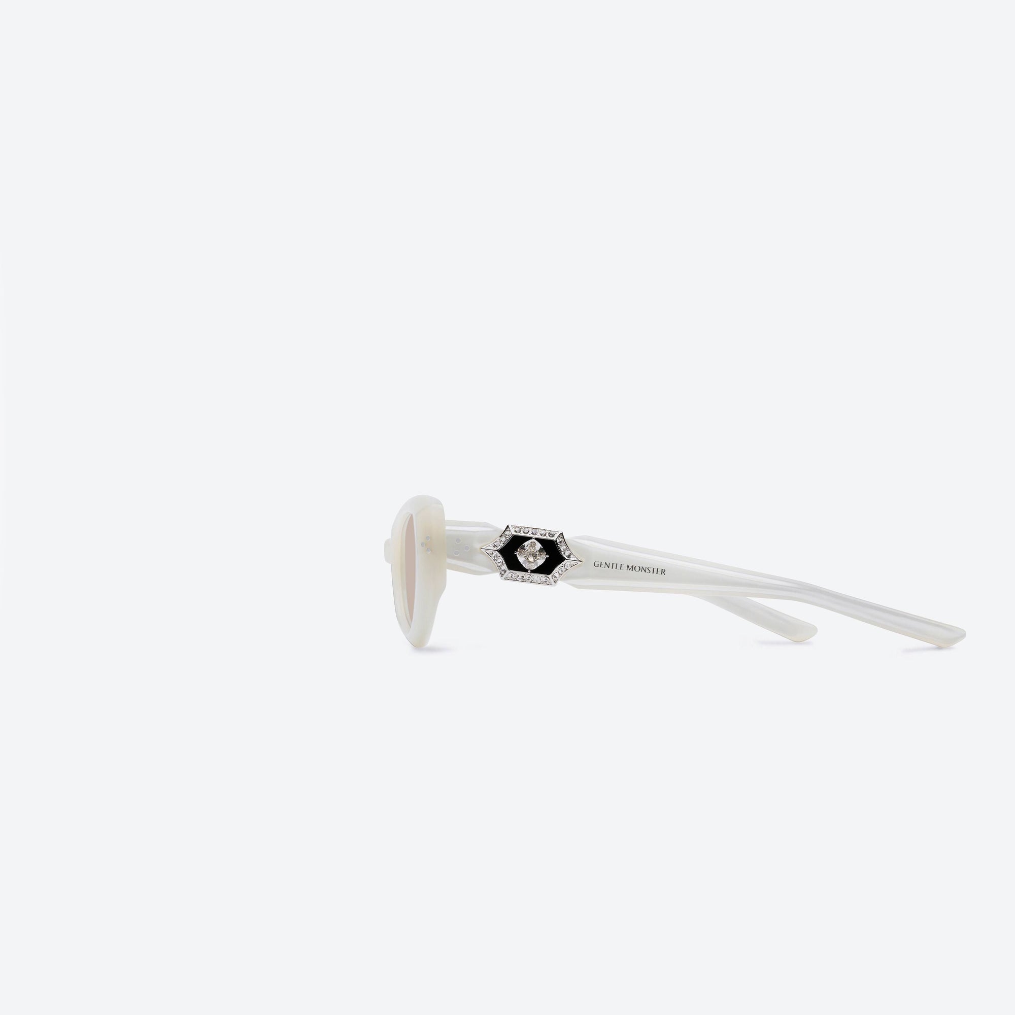 A detailed left view of Gentle Monster Ruvy Van WC6 White Acetate framed Cat-eye sunglasses.