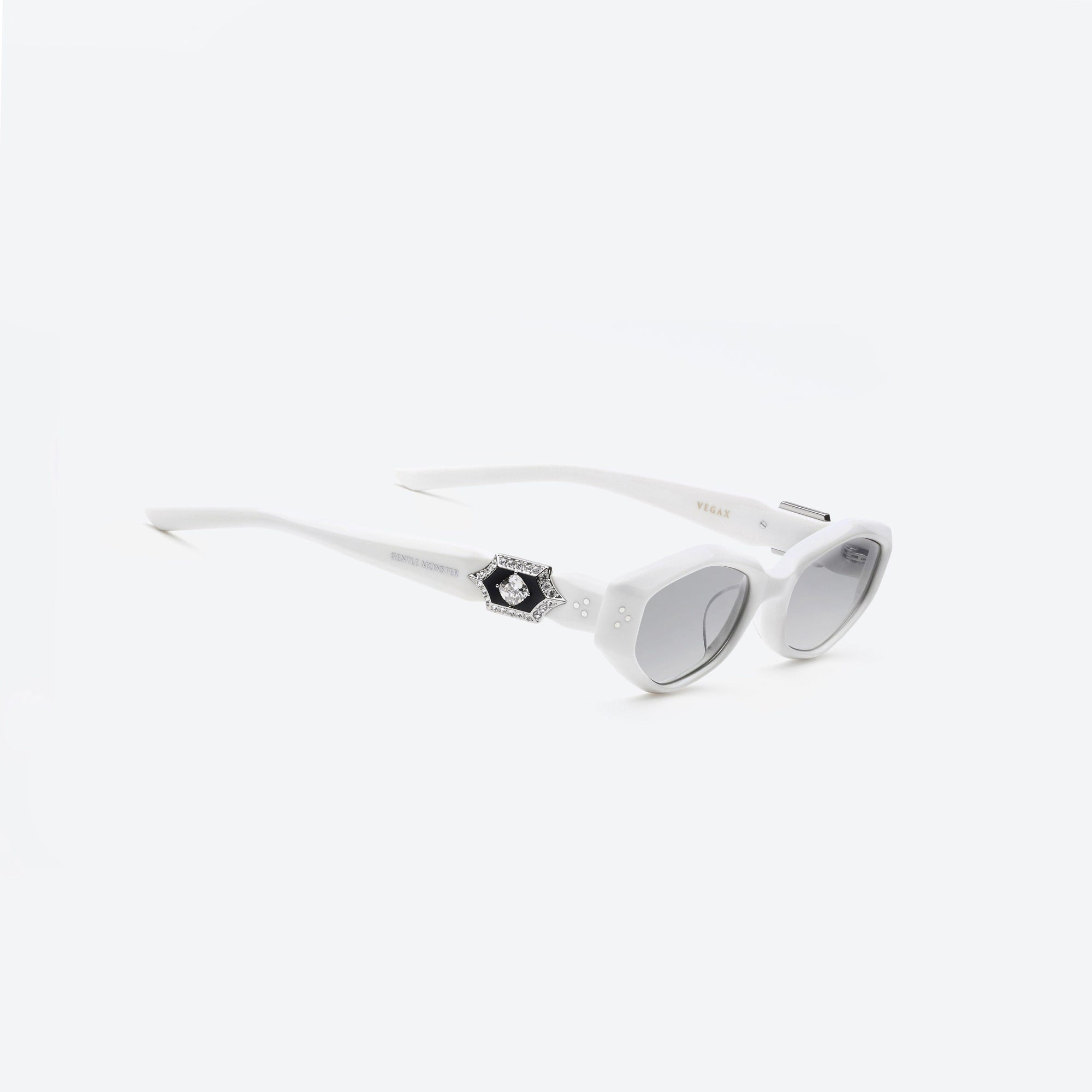 45-degree detailed view of Gentle Monster Vegax W2 White Acetate framed Oval sunglasses.