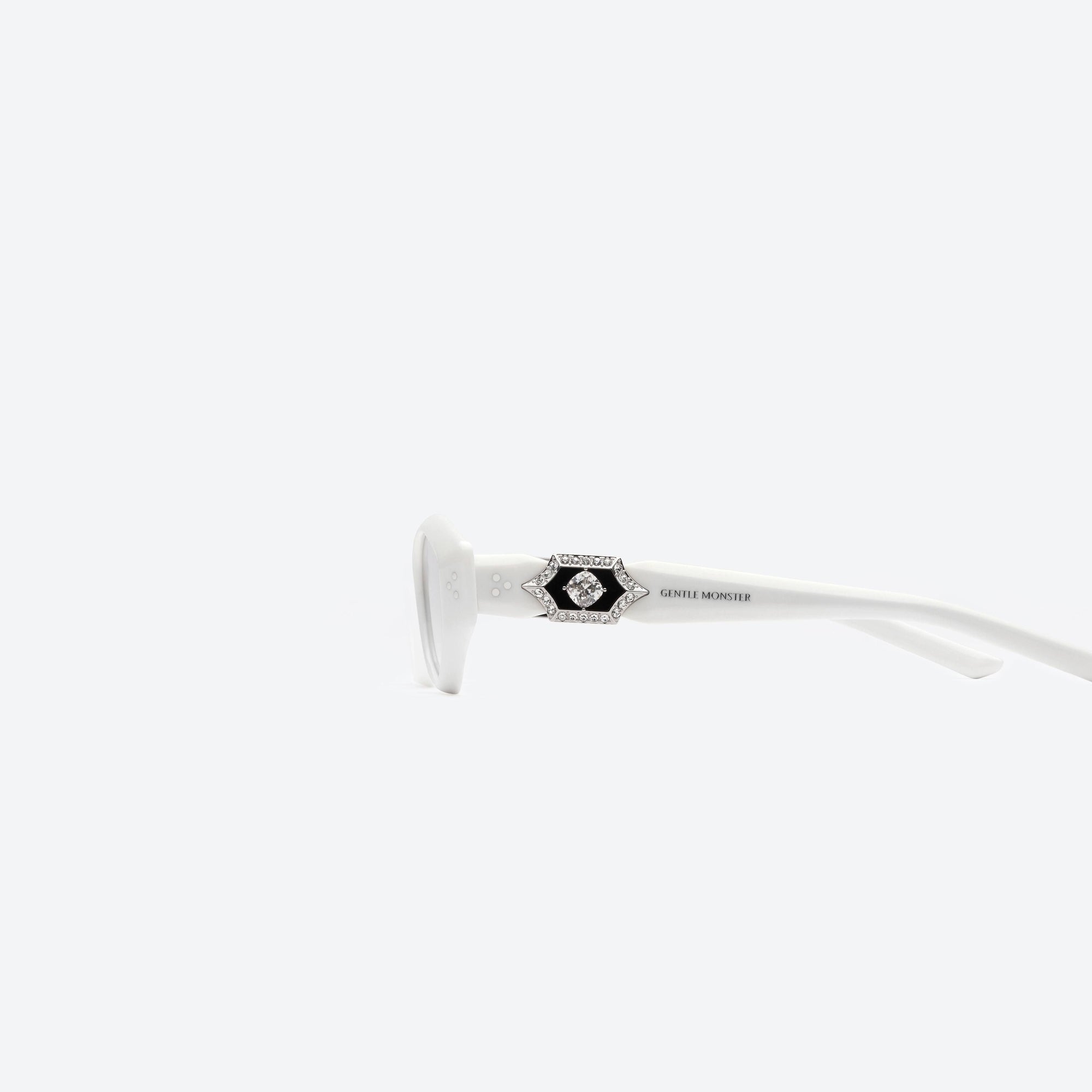 A detailed left view of Gentle Monster Vegax W2 White Acetate framed Oval sunglasses.