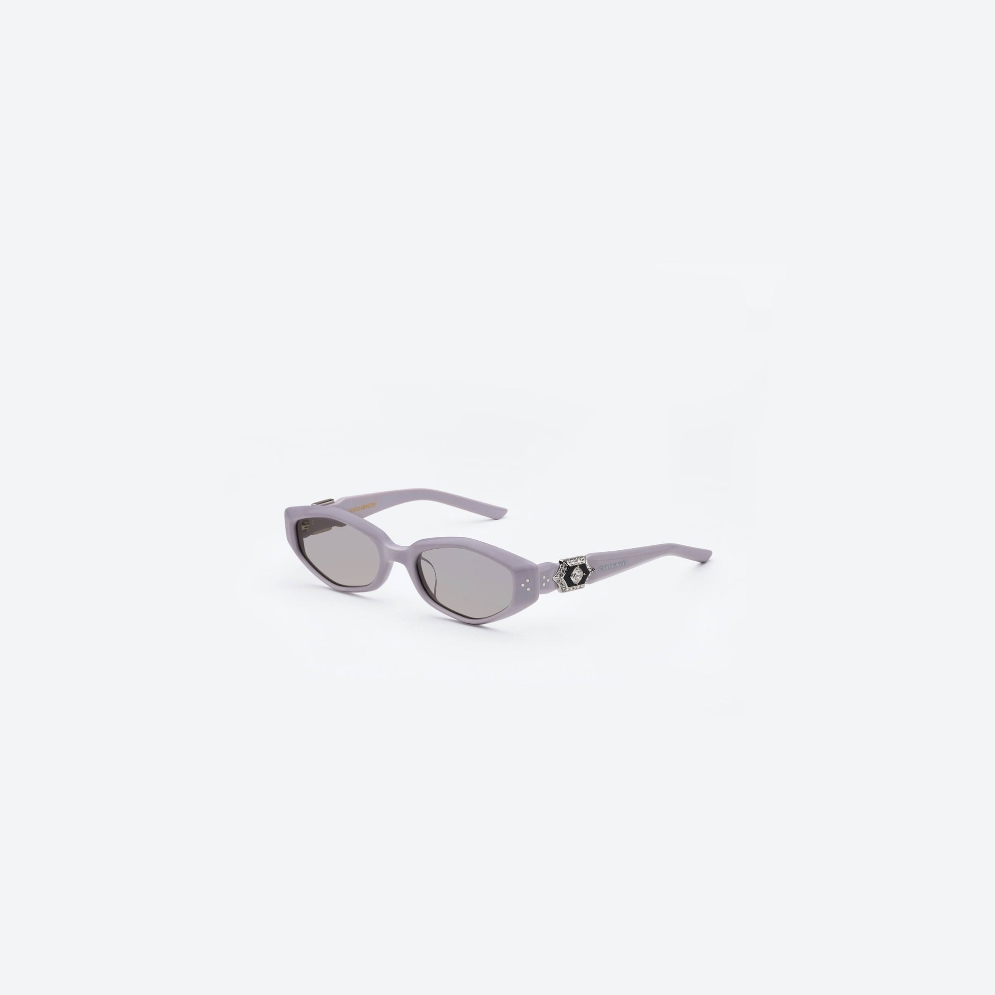 45-degree view of Gentle Monster Vegax V4 Purple Acetate framed Oval sunglasses.