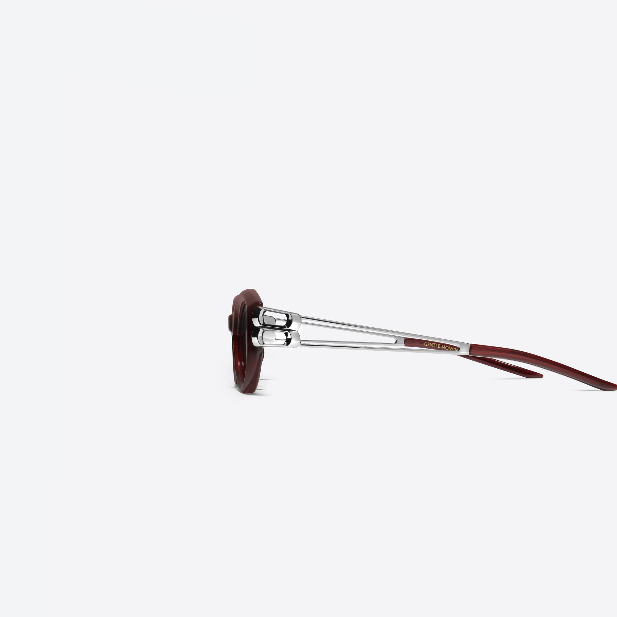 A detailed left view of Gentle Monster Kunst RC3 Red Mixed framed Cat-eye sunglasses.