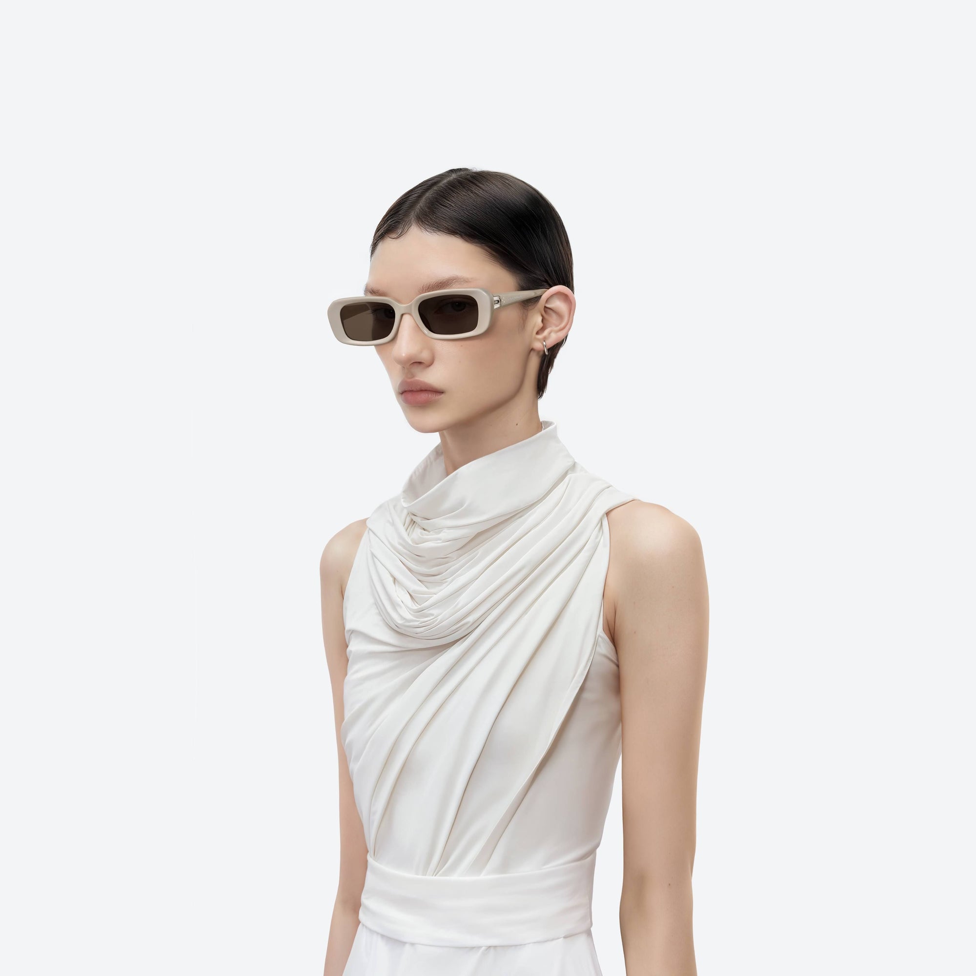 Model wearing the Melrose IV3 Ivory Acetate framed Square sunglasses.