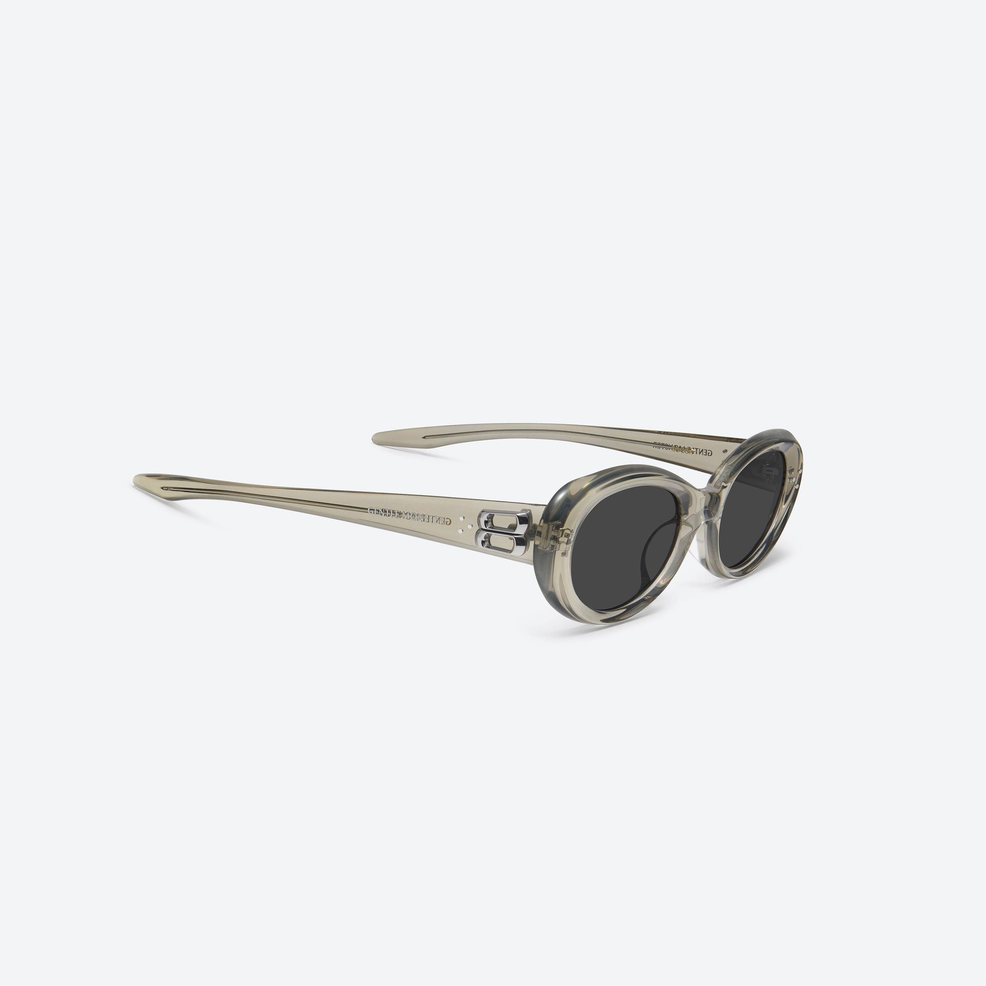 45-degree detailed view of Gentle Monster Cocoa BRC11 Brown Acetate framed Oval sunglasses.