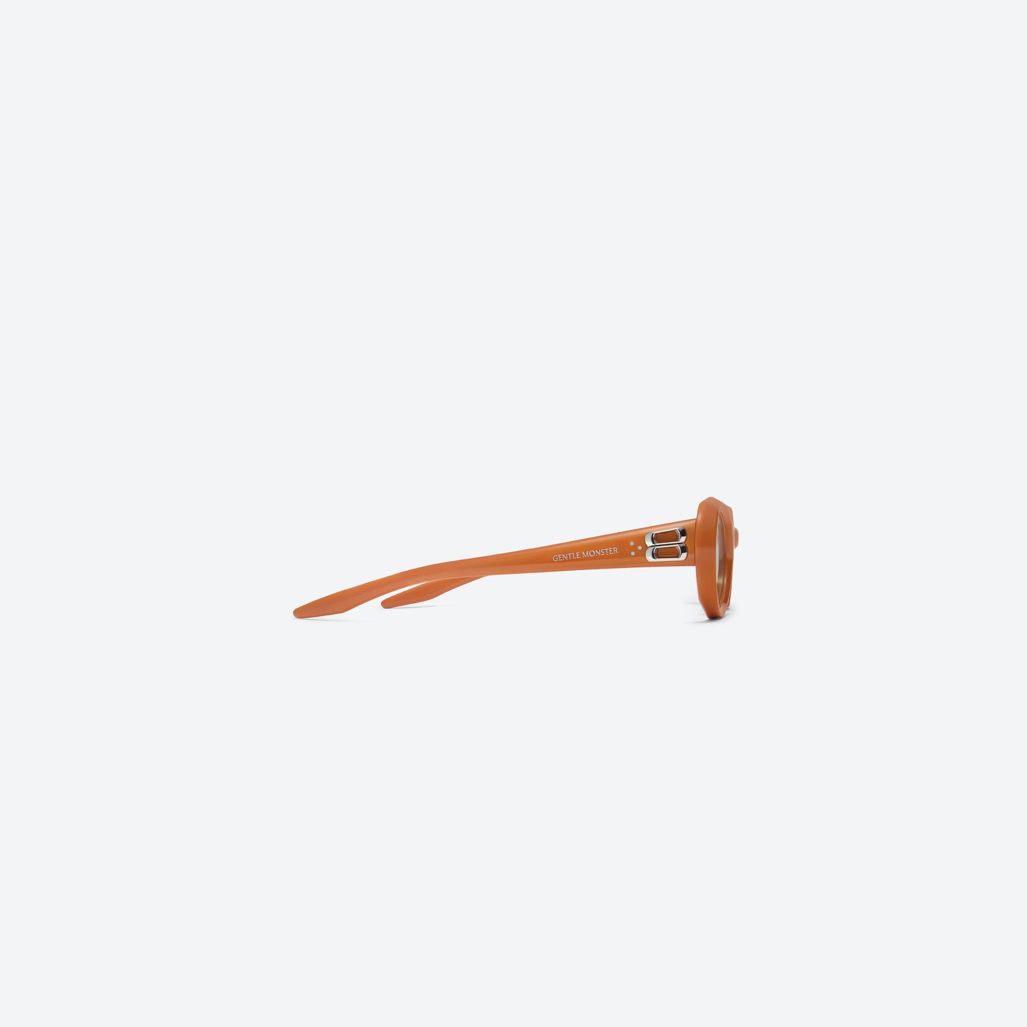 A detailed right view of Gentle Monster Cocoa OR3 Orange Acetate framed Oval sunglasses.