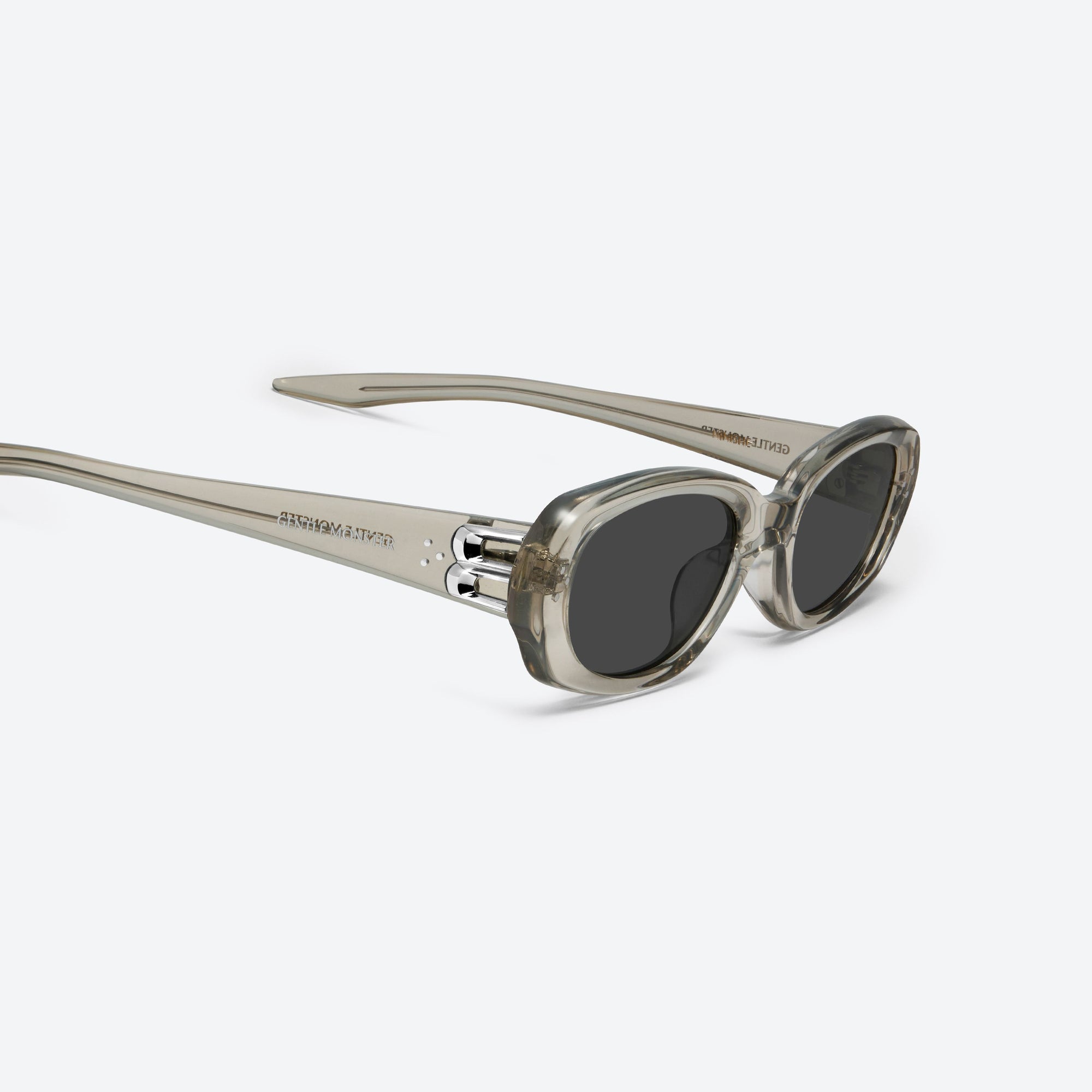 45-degree detailed view of Gentle Monster Ninishe BRC11 Brown Acetate framed Oval sunglasses.