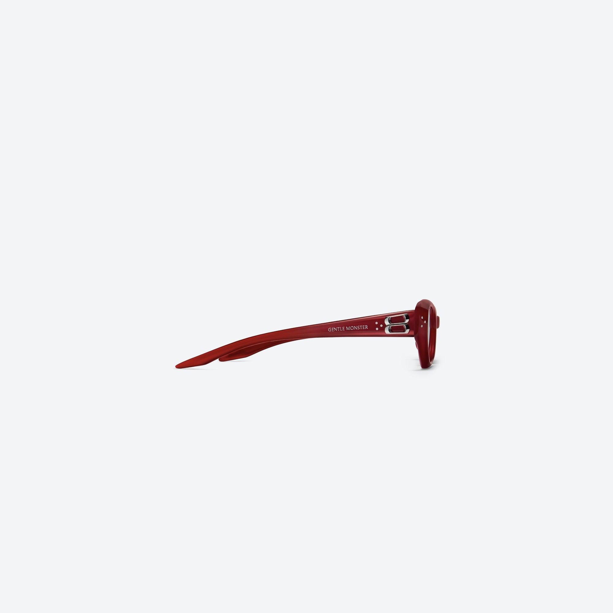 A detailed right view of Gentle Monster Duns R6 Red Acetate framed Cat-eye sunglasses.