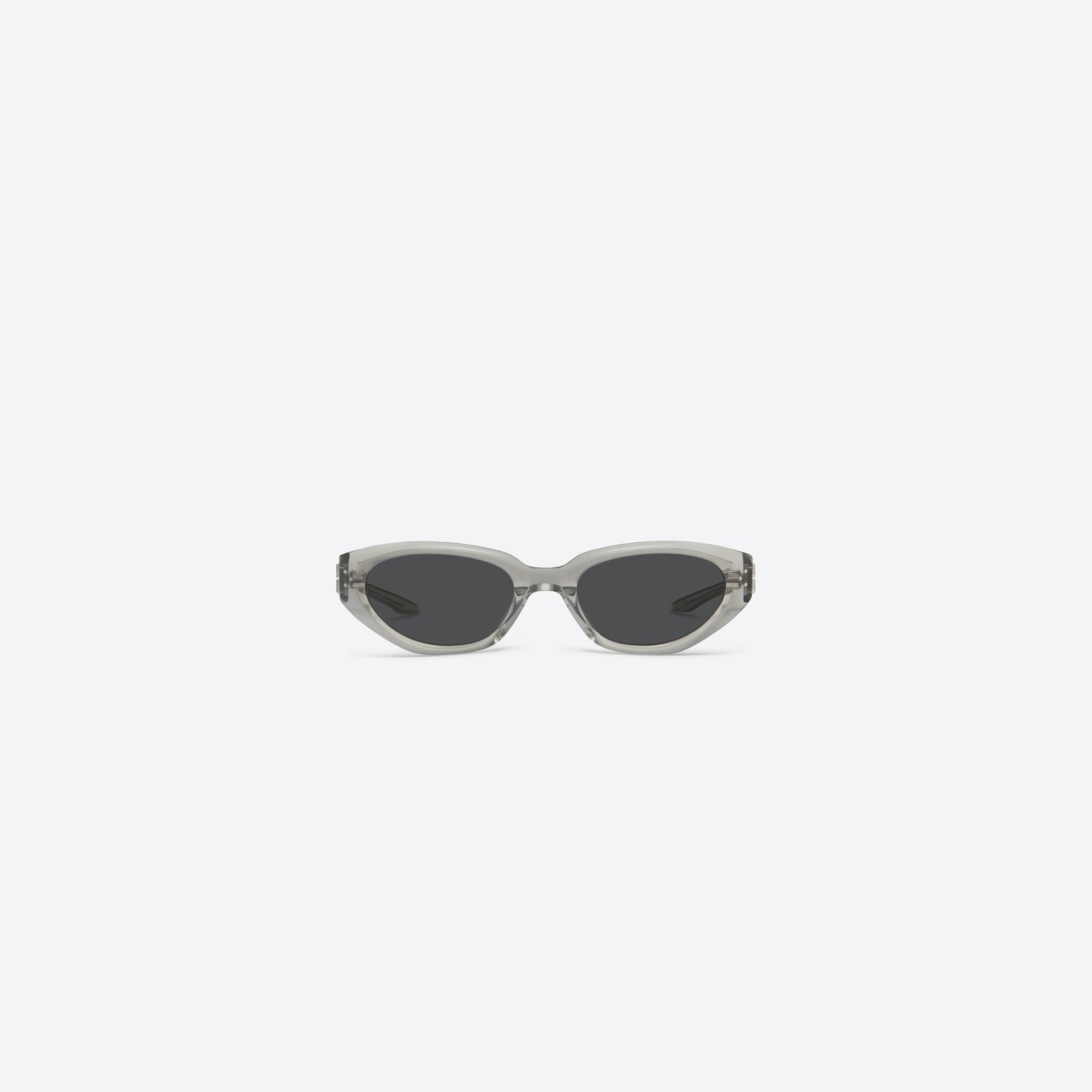A front view of Gentle Monster Duns BRC11 Brown Acetate framed Cat-eye sunglasses.