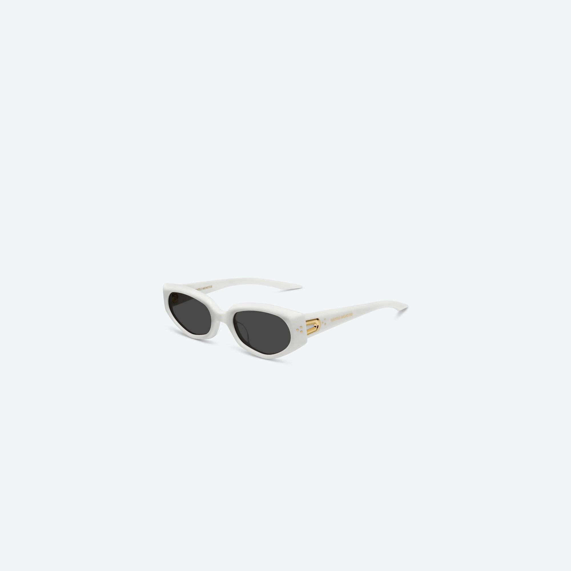 45-degree view of Gentle Monster Devon W2 White Acetate framed Cat-eye sunglasses.