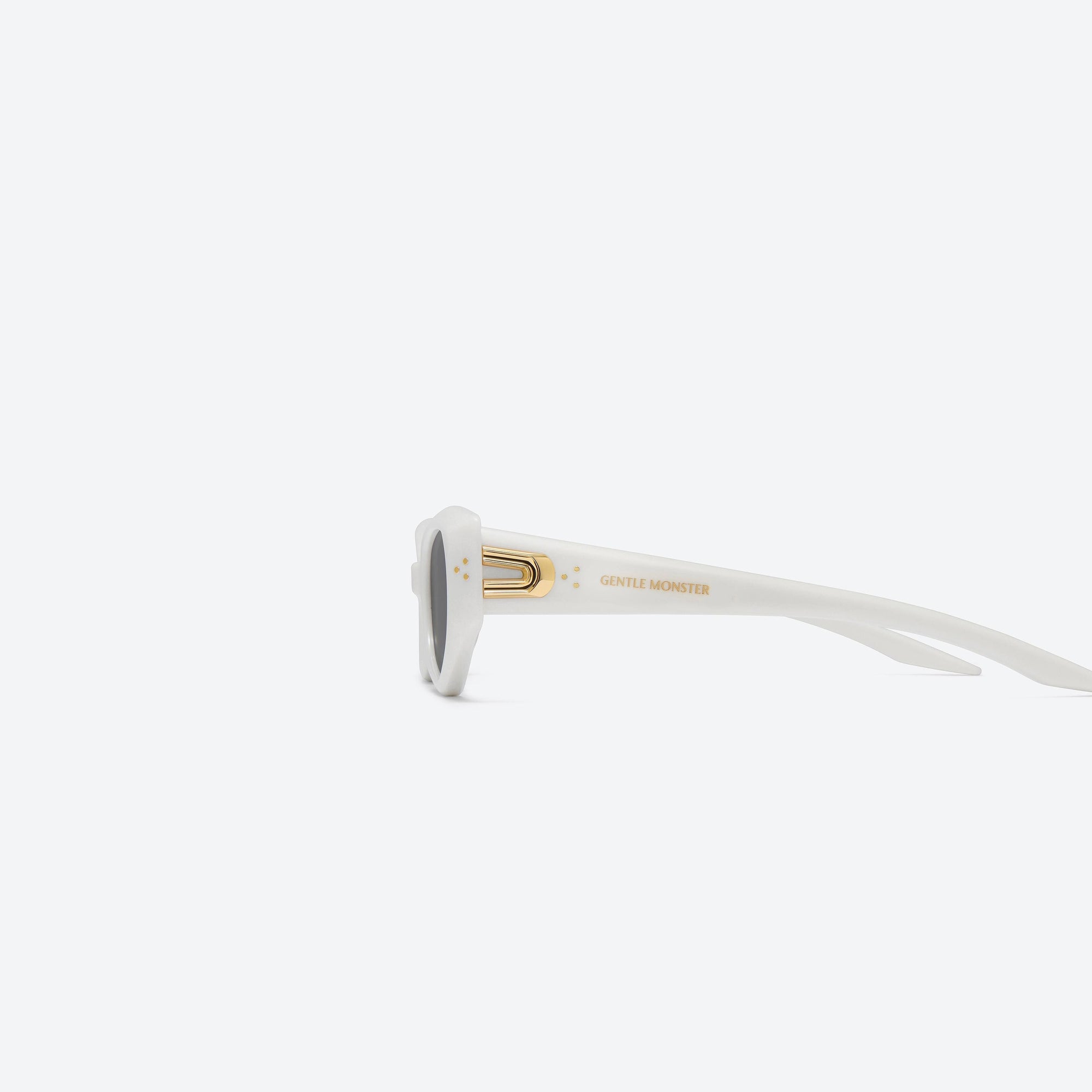 A detailed left view of Gentle Monster Devon W2 White Acetate framed Cat-eye sunglasses.