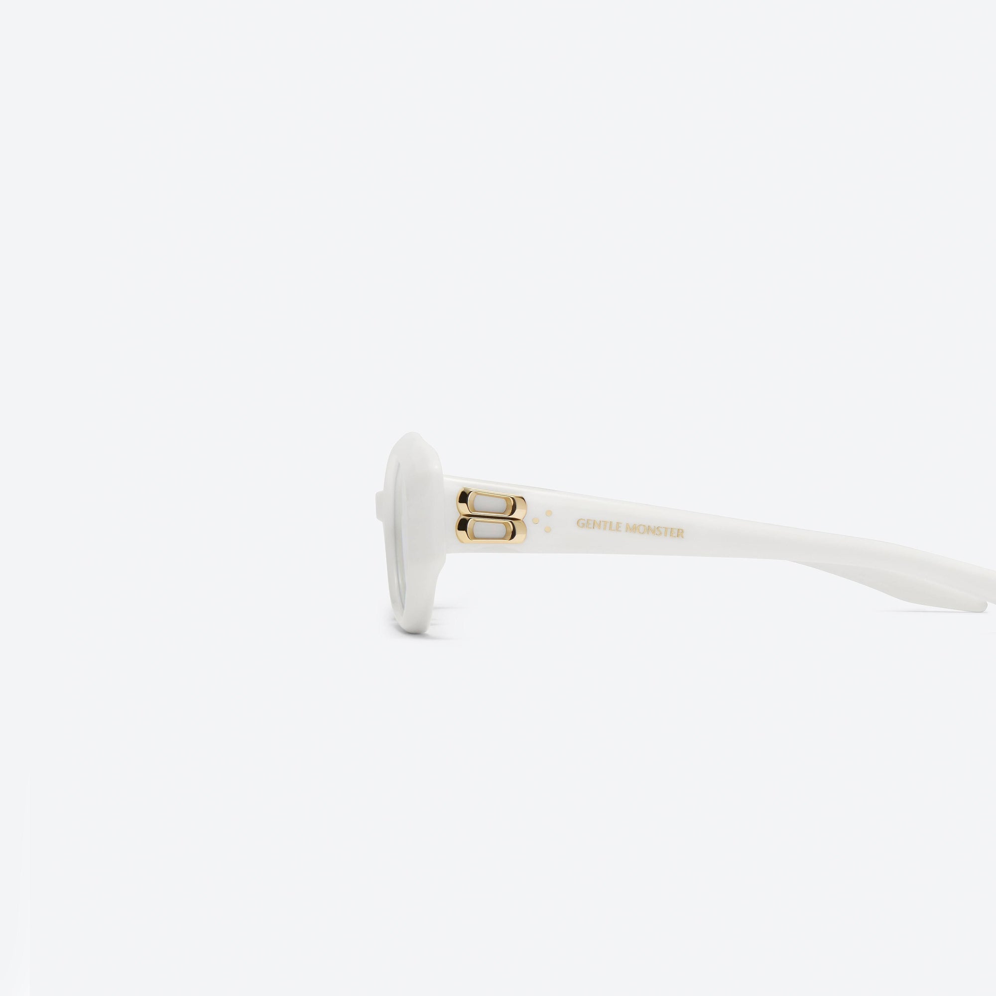 A detailed left view of Gentle Monster Miro W2 White Acetate framed Oval sunglasses.