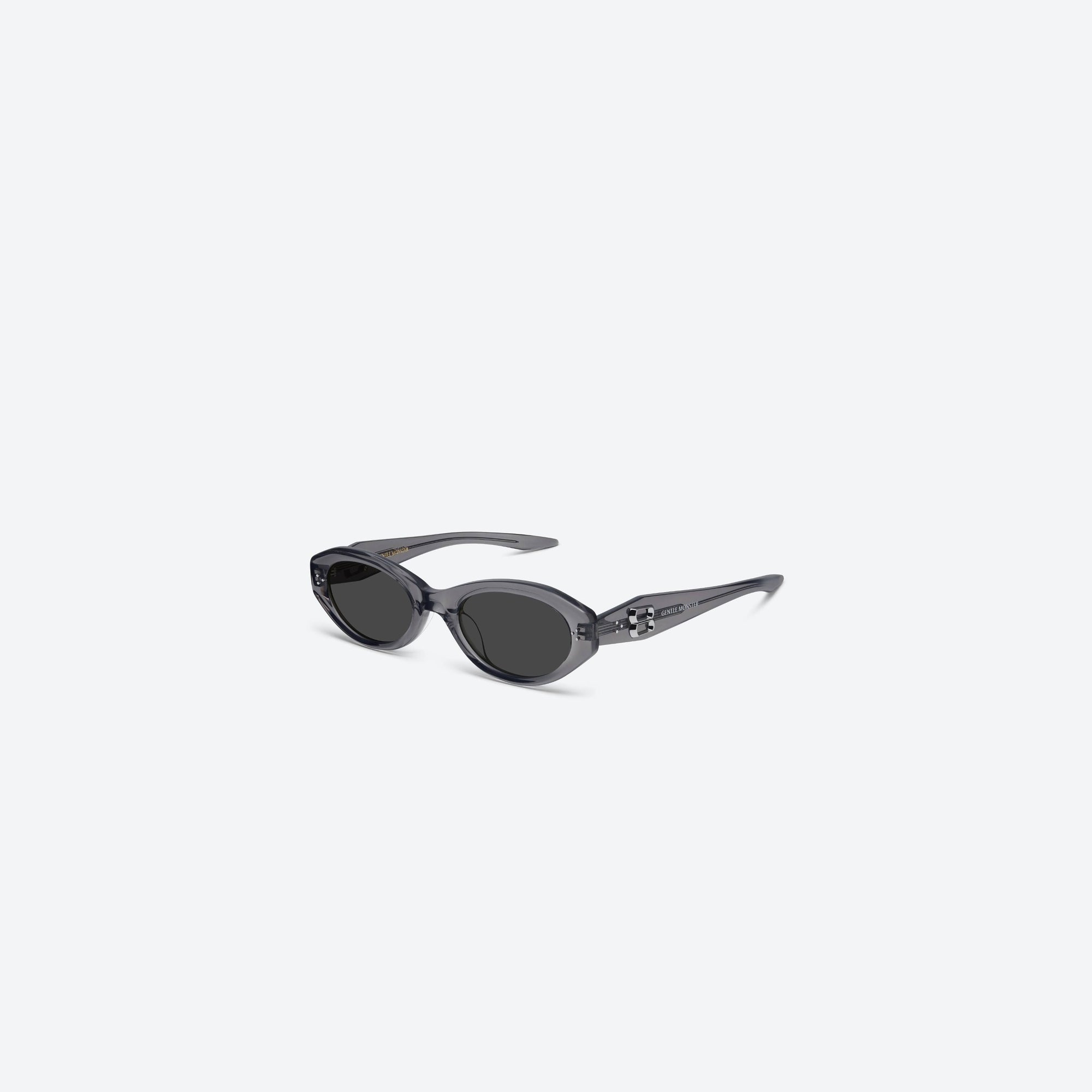 45-degree view of Gentle Monster Vamp GC12 Gray Acetate framed Oval sunglasses.