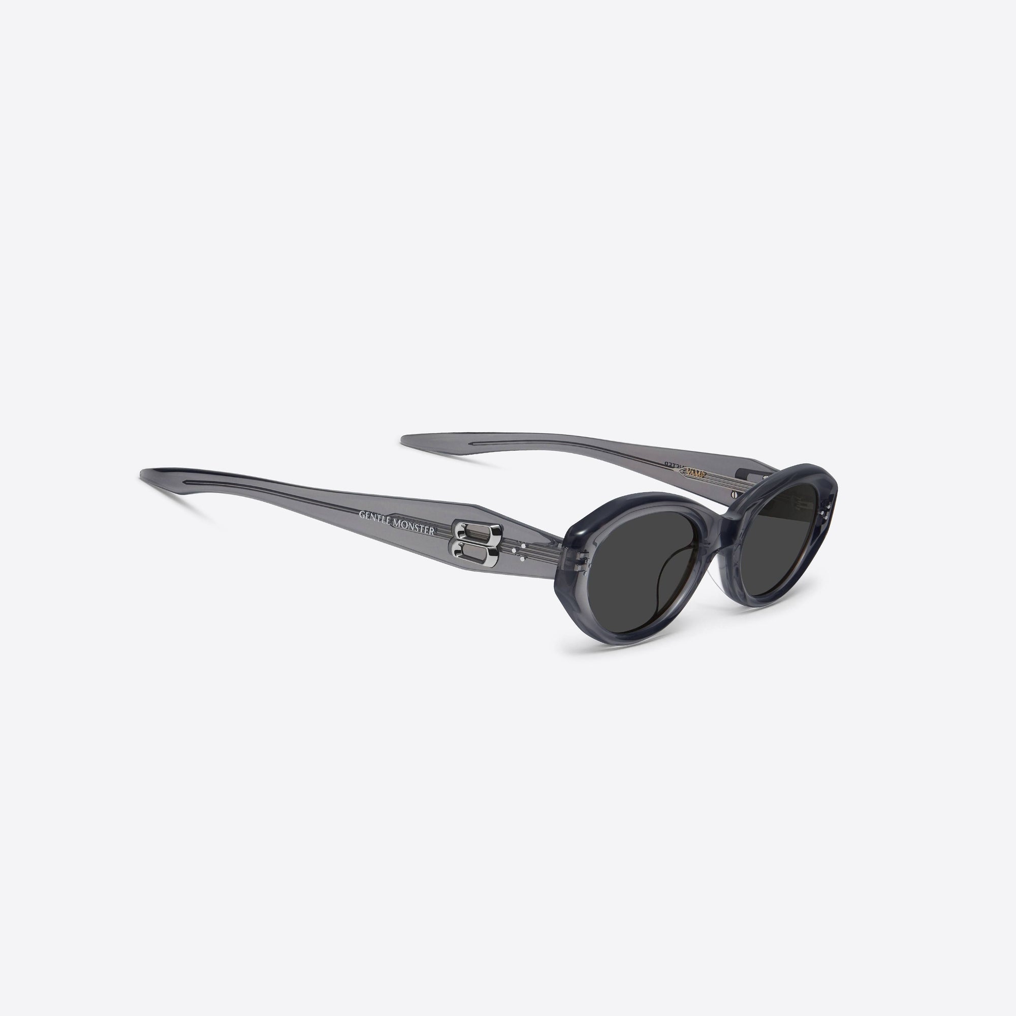 45-degree detailed view of Gentle Monster Vamp GC12 Gray Acetate framed Oval sunglasses.