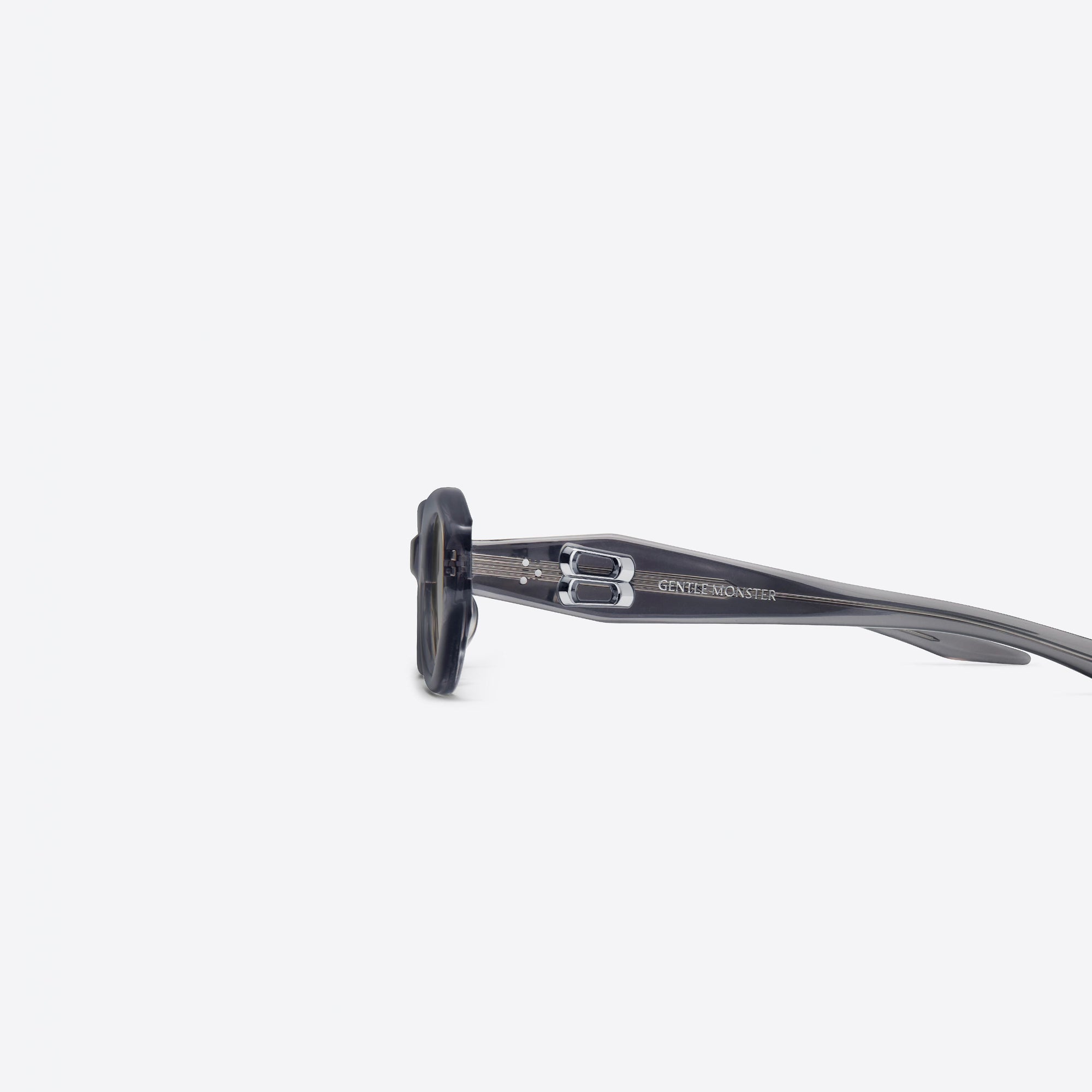 A detailed left view of Gentle Monster Vamp GC12 Gray Acetate framed Oval sunglasses.