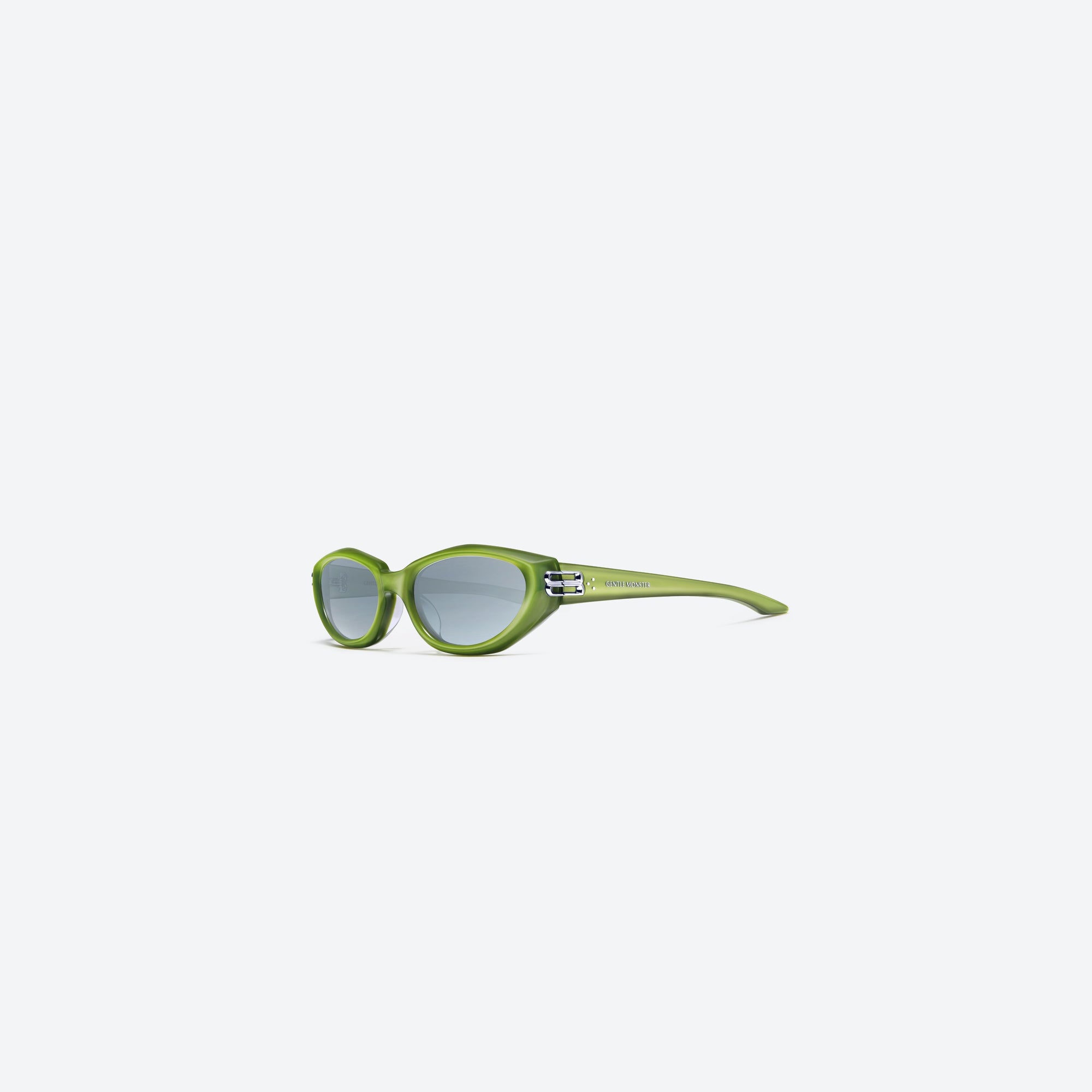 45-degree view of Gentle Monster Sosomo GRC5 Green Acetate framed Oval sunglasses.