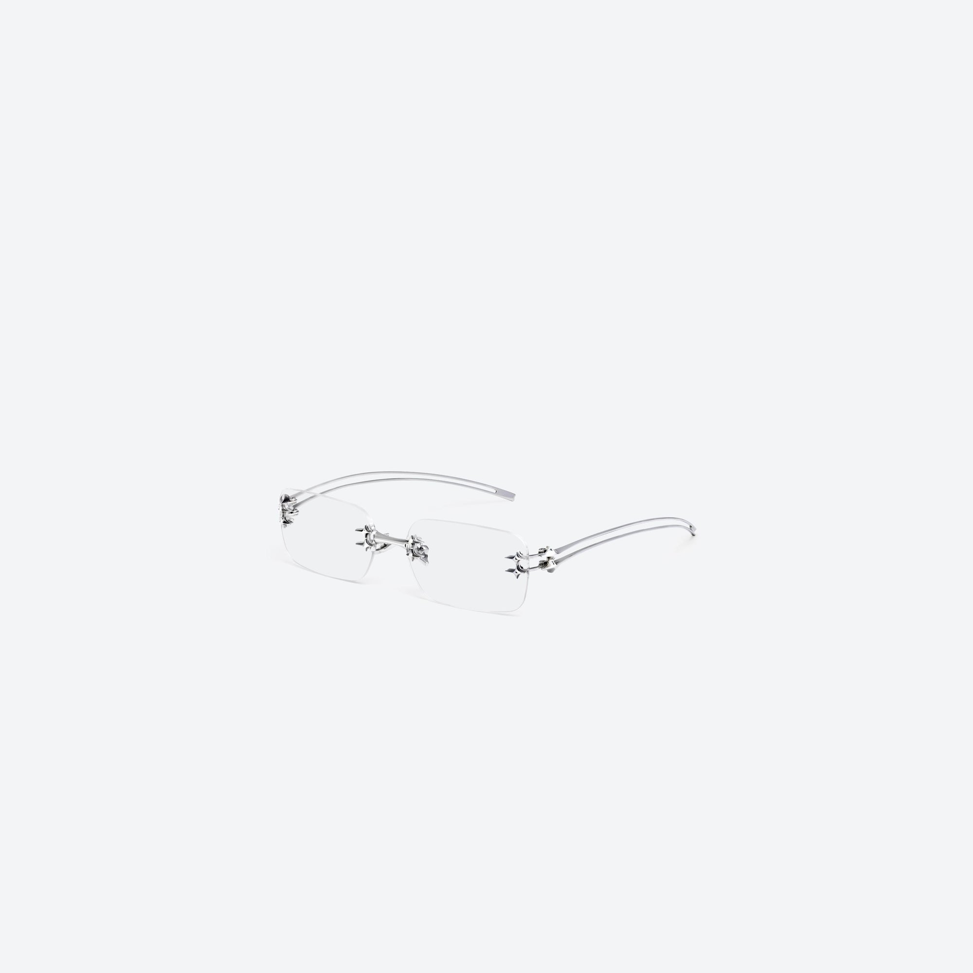 45-degree view of Gentle Monster Tetra 02 Silver Metal framed Square sunglasses.