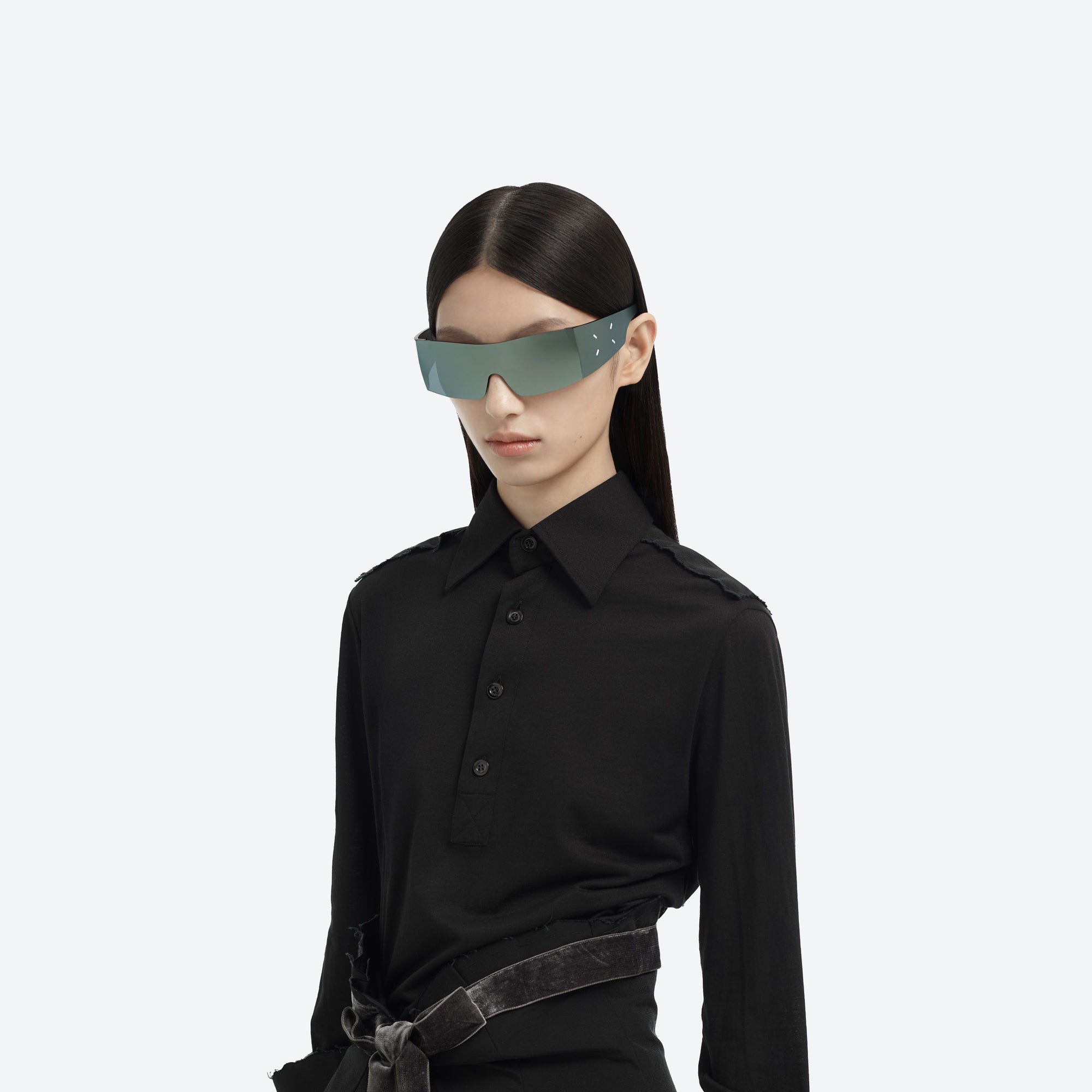 Model wearing the Maison Margiela - MM201 MGR1 Green Nylon framed Wraparound sunglasses.