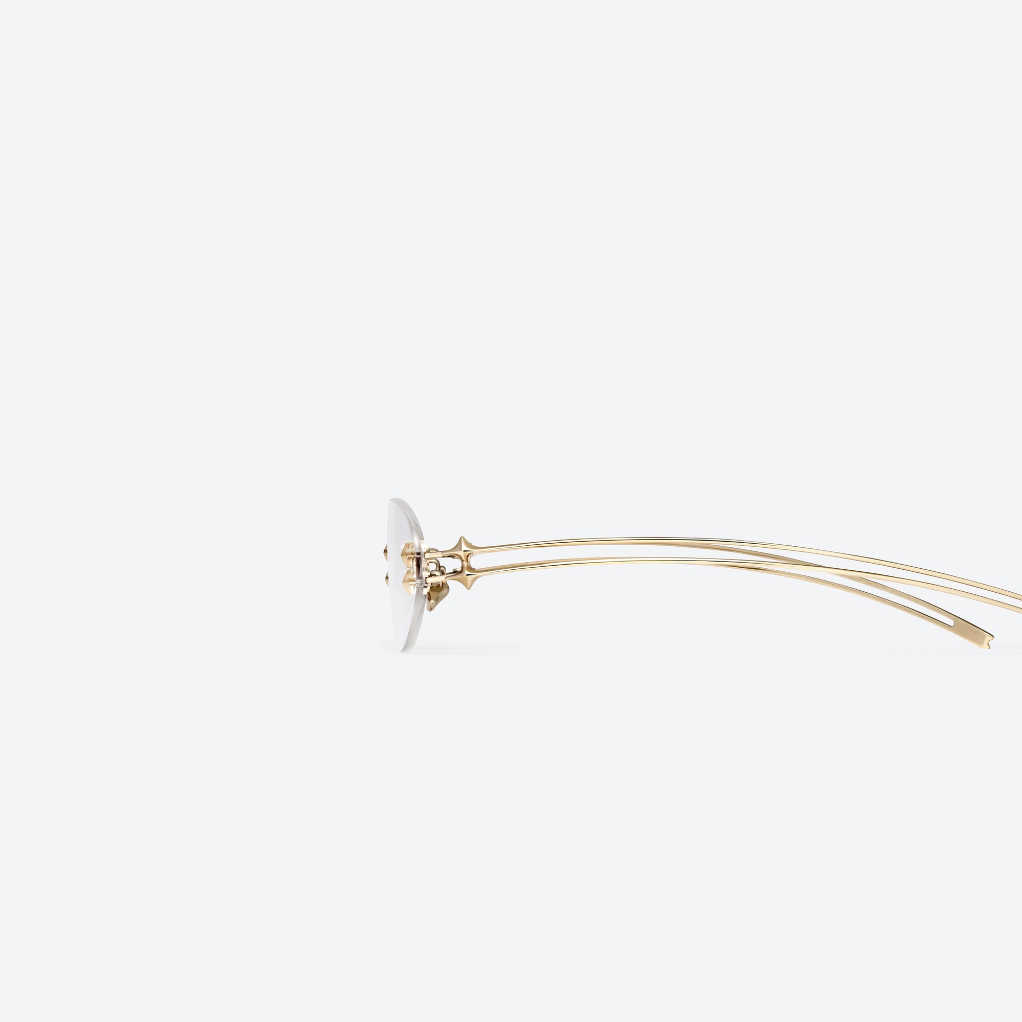 A detailed left view of Gentle Monster Node 030 Gold Metal framed Oval sunglasses.