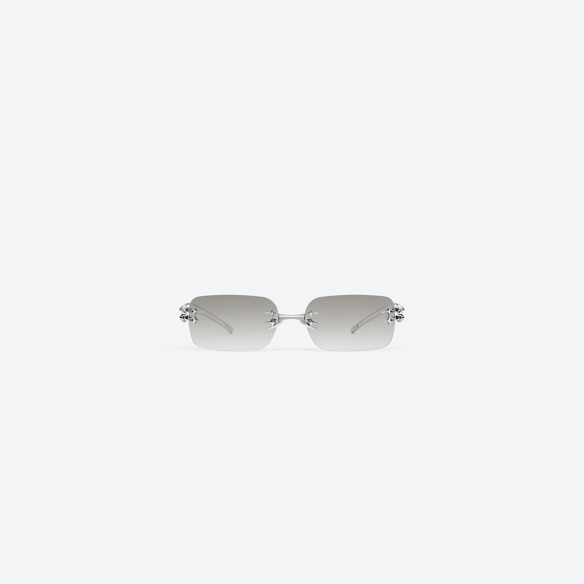 A front view of Gentle Monster Tetra 02(BRM) Silver Metal framed Square sunglasses.