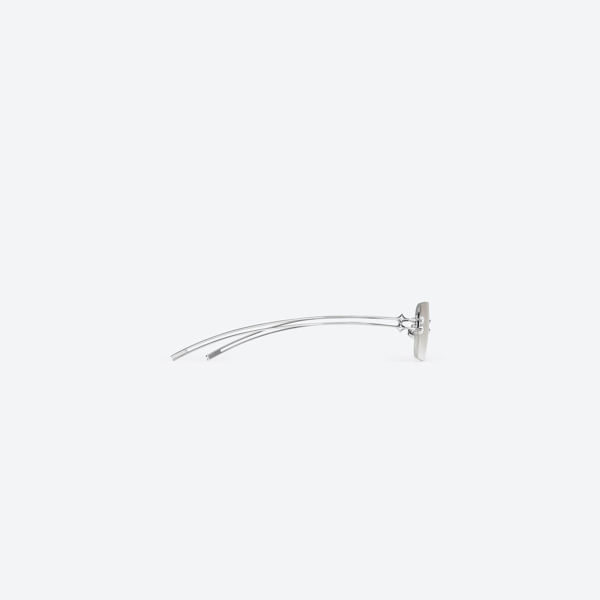 A detailed right view of Gentle Monster Tetra 02(BRM) Silver Metal framed Square sunglasses.