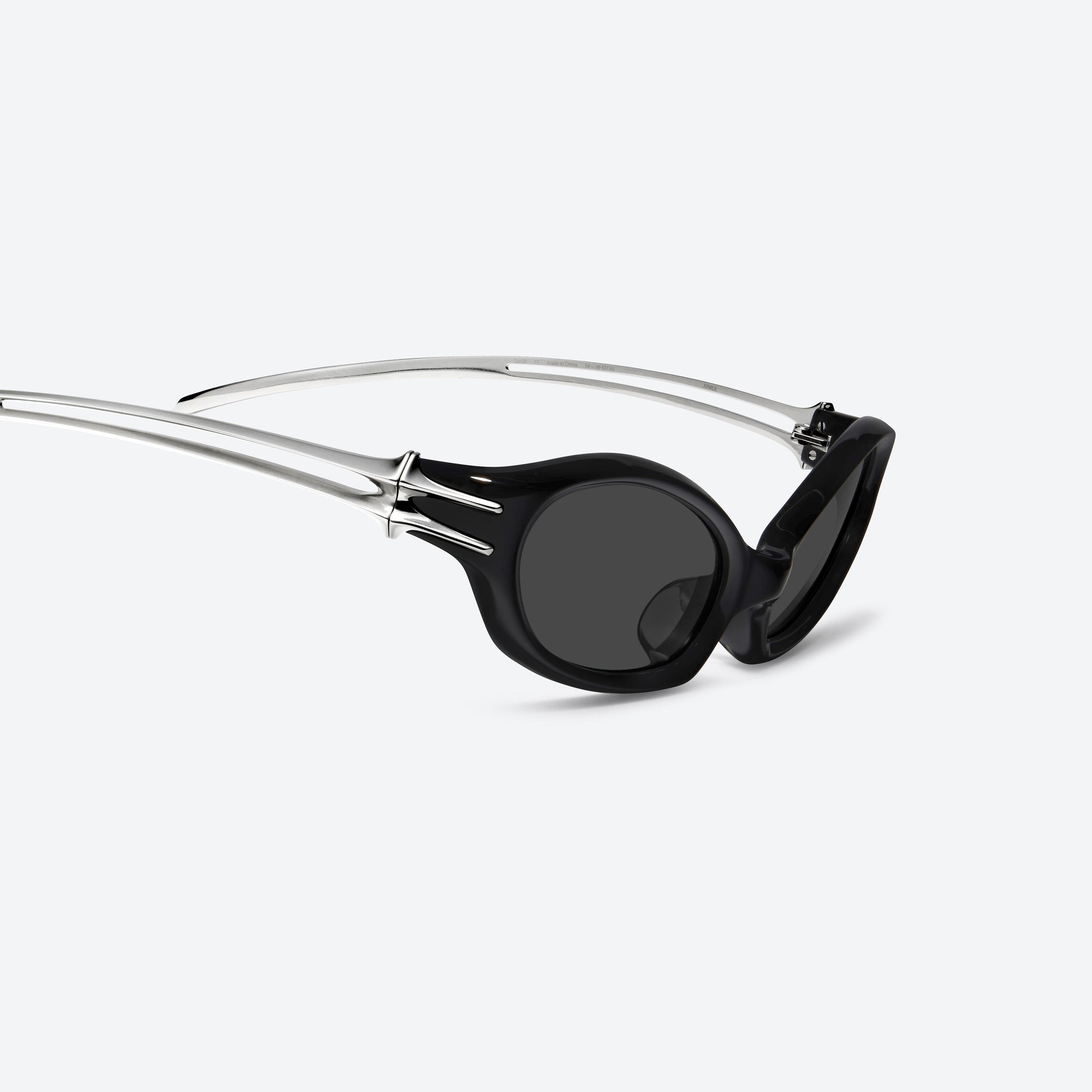 45-degree detailed view of Gentle Monster Ximul 01 Black Mixed framed Cat-eye sunglasses.