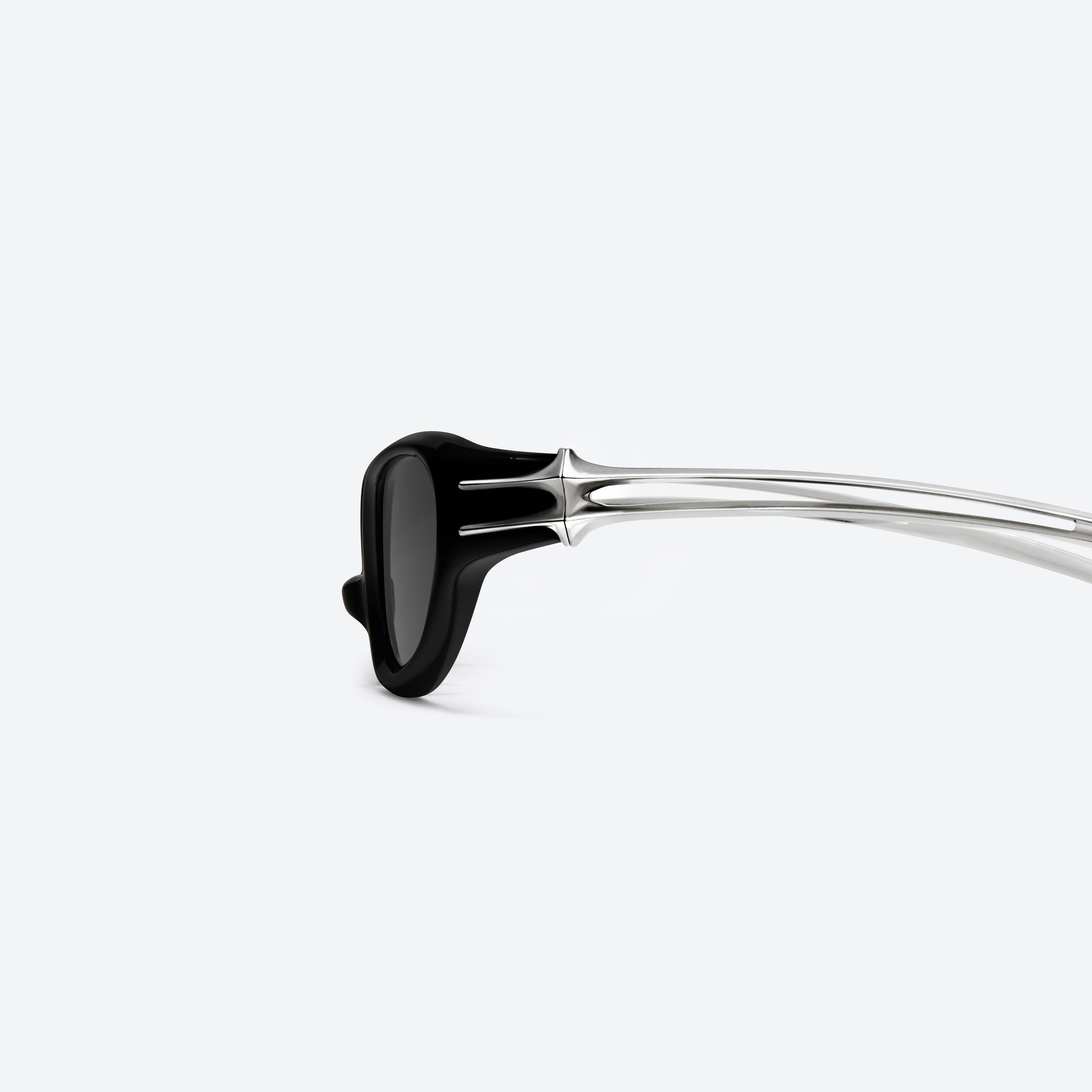 A detailed left view of Gentle Monster Post Human 01 Black Mixed framed Cat-eye sunglasses.