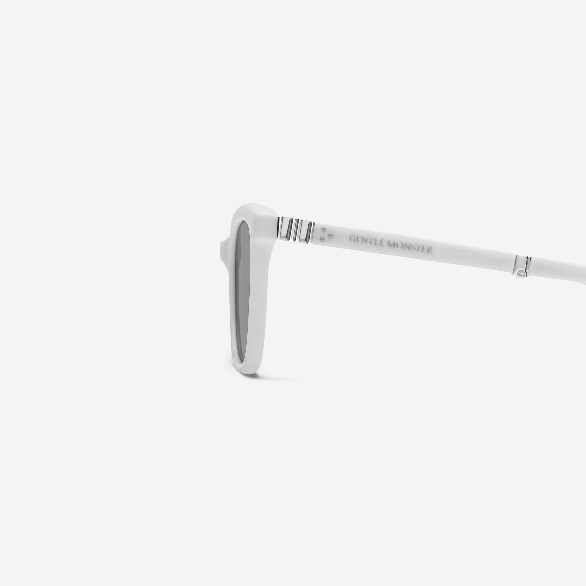 A detailed left view of Gentle Monster Matiny W2 White Acetate framed Square sunglasses.