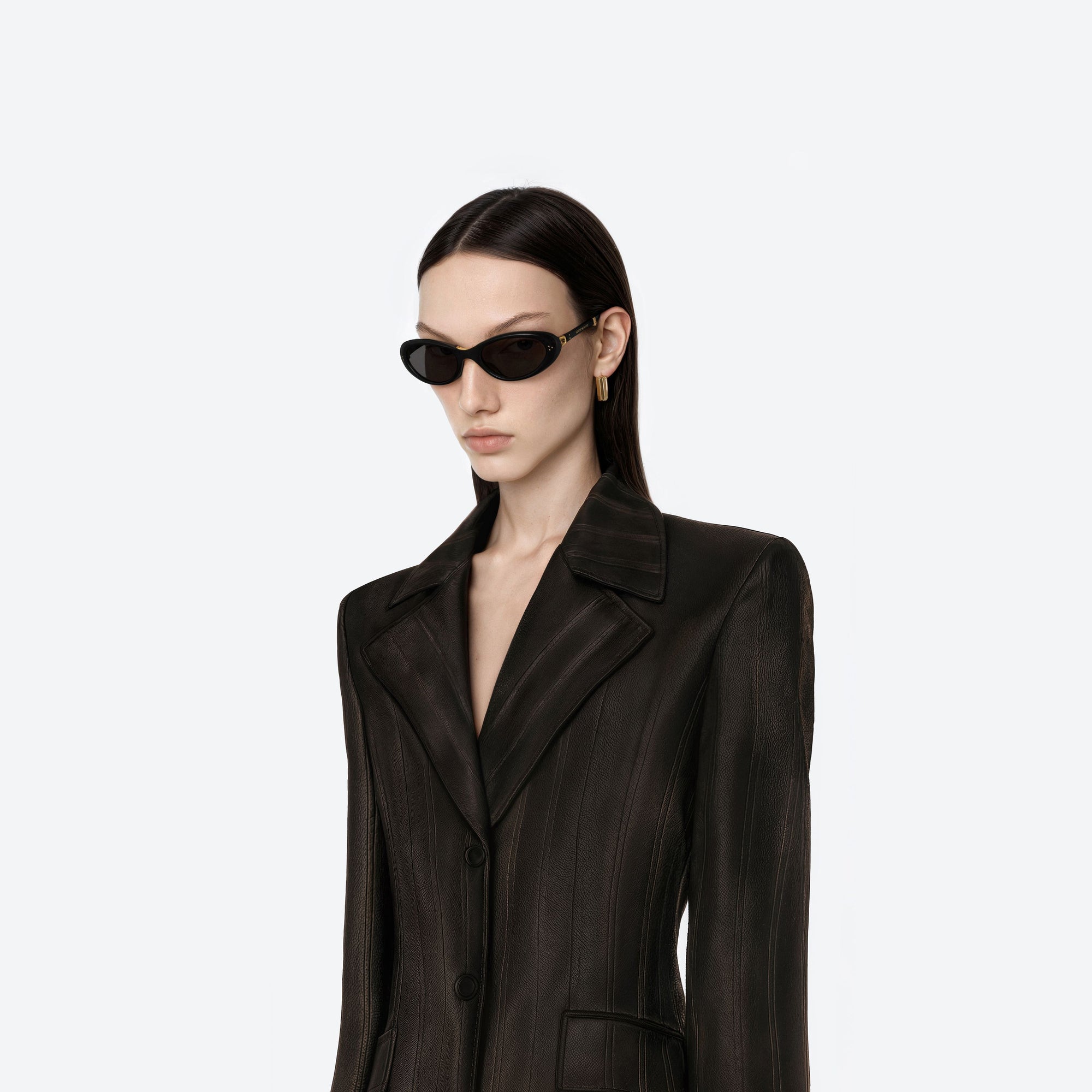 Model wearing the Lolang 01 Black Acetate framed Oval sunglasses.
