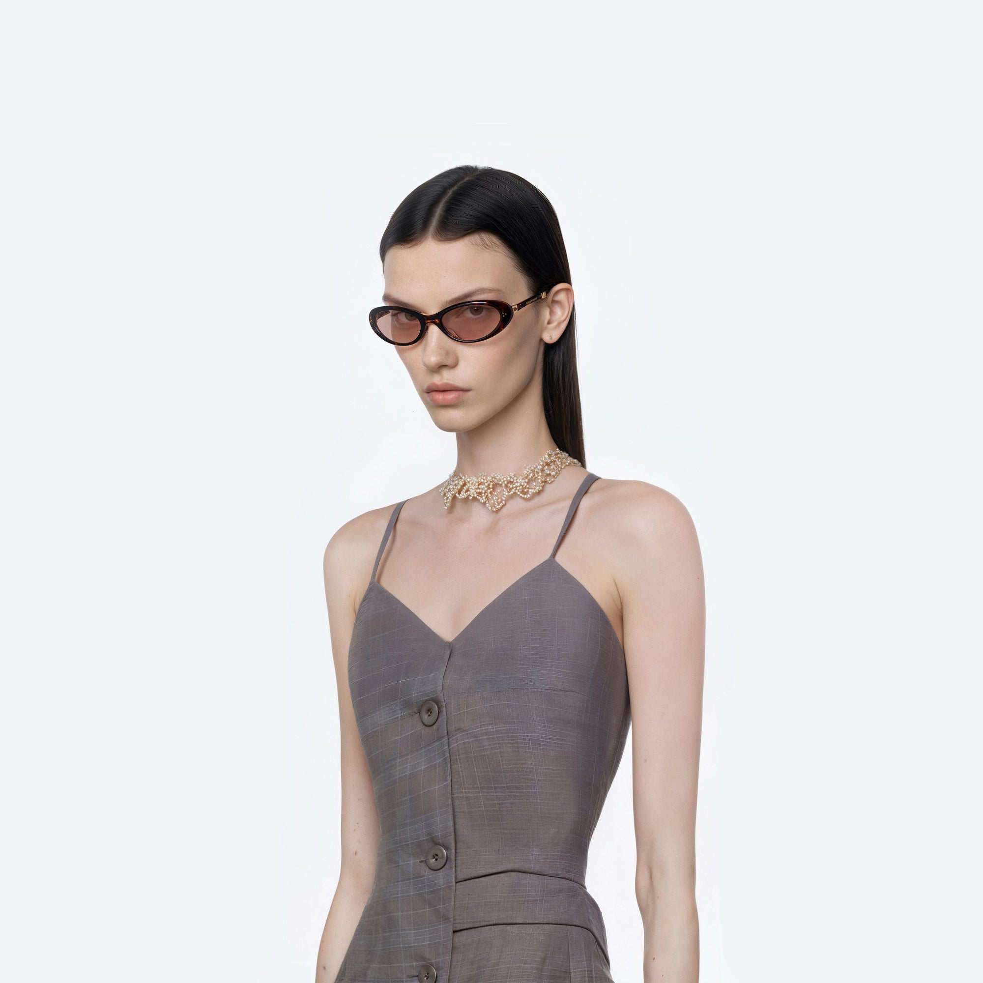 Model wearing the Lolang T1 Tortoise Acetate framed Oval sunglasses.