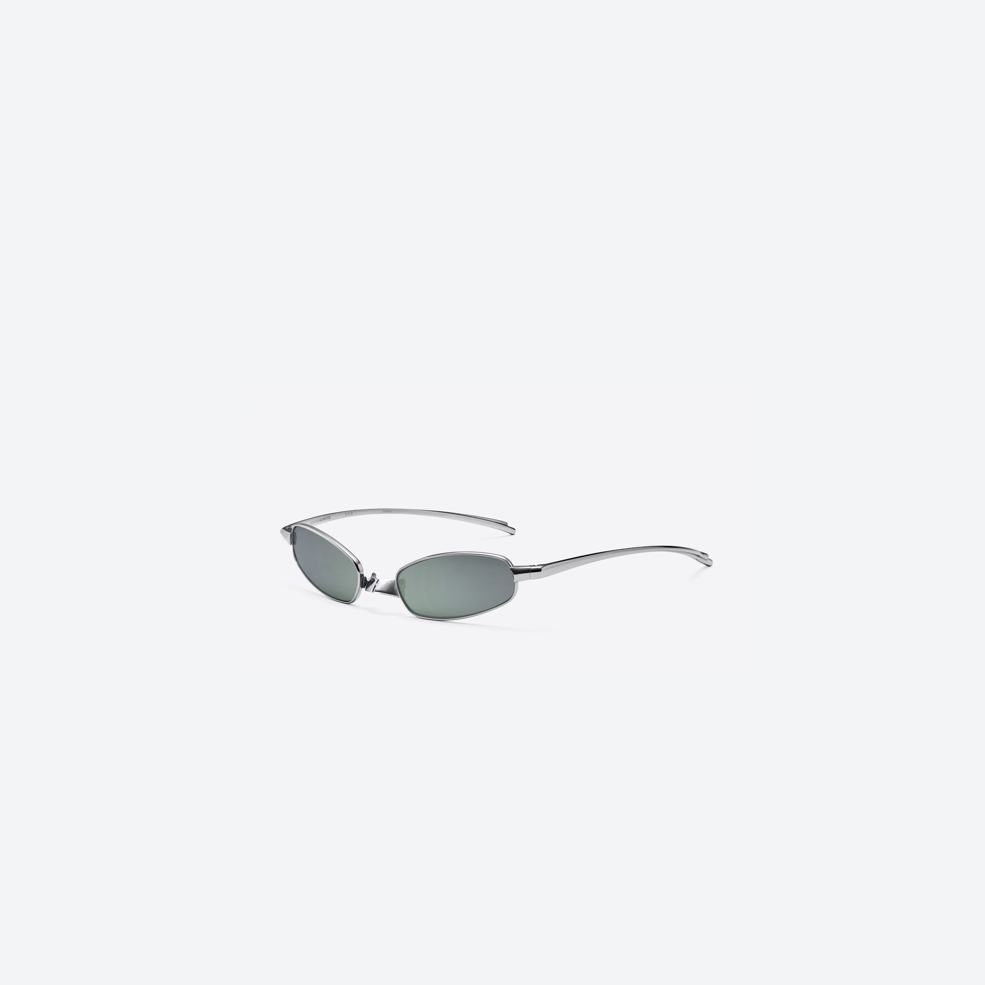 45-degree view of Gentle Monster Brutal 02 Silver Metal framed Square sunglasses.