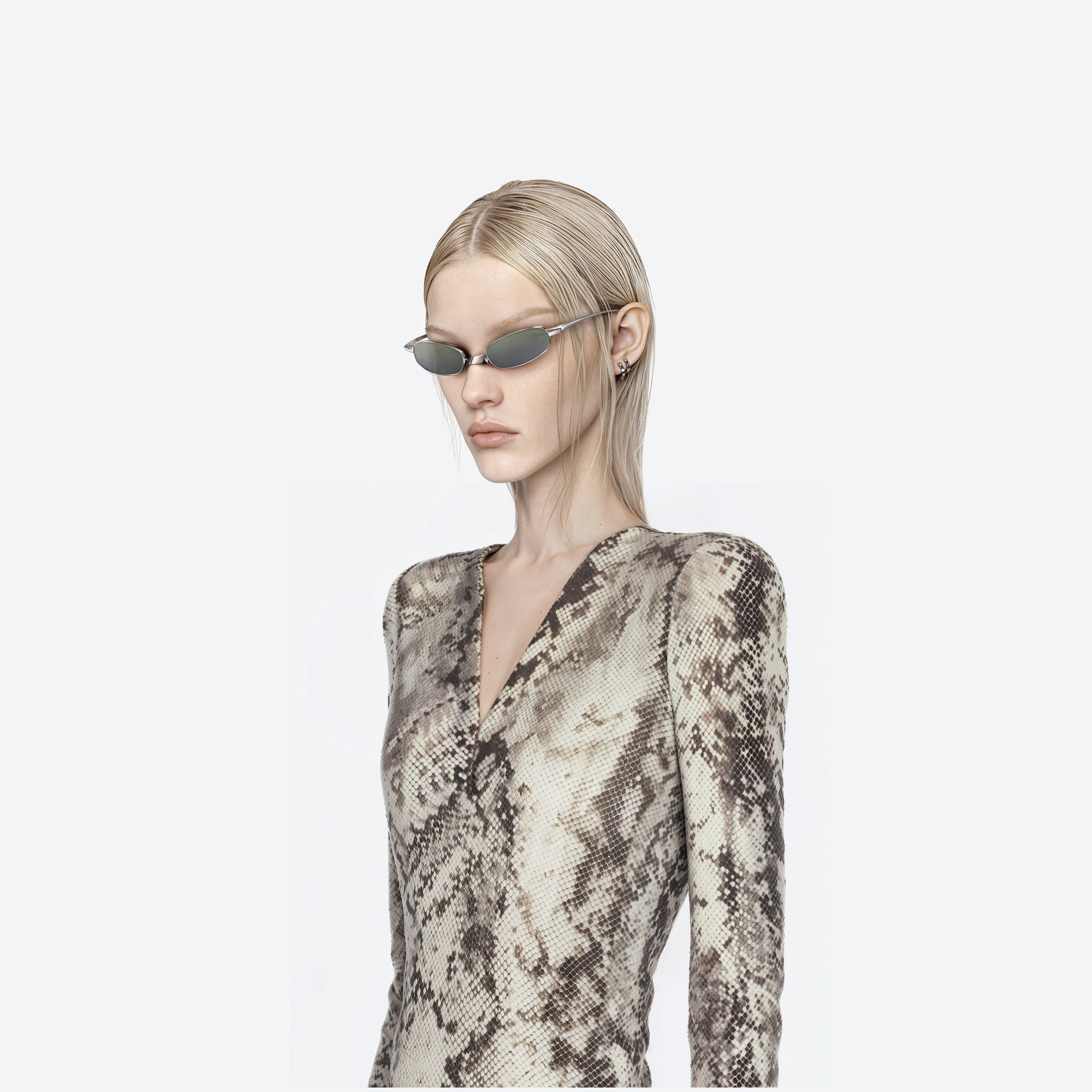 Model wearing the Brutal 02 Silver Metal framed Square sunglasses.