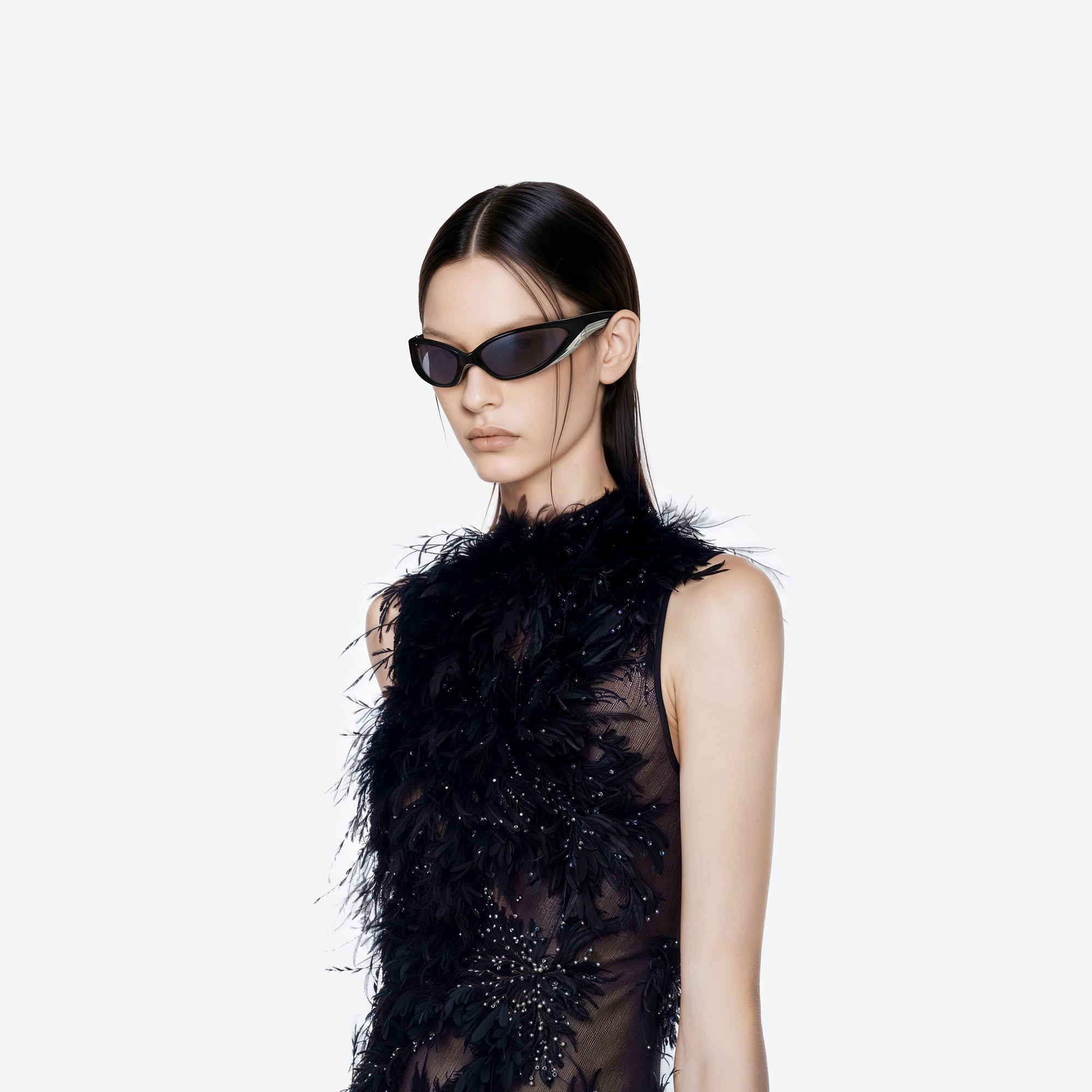 Model wearing the Apex 01 Black Nylon framed Wraparound sunglasses.