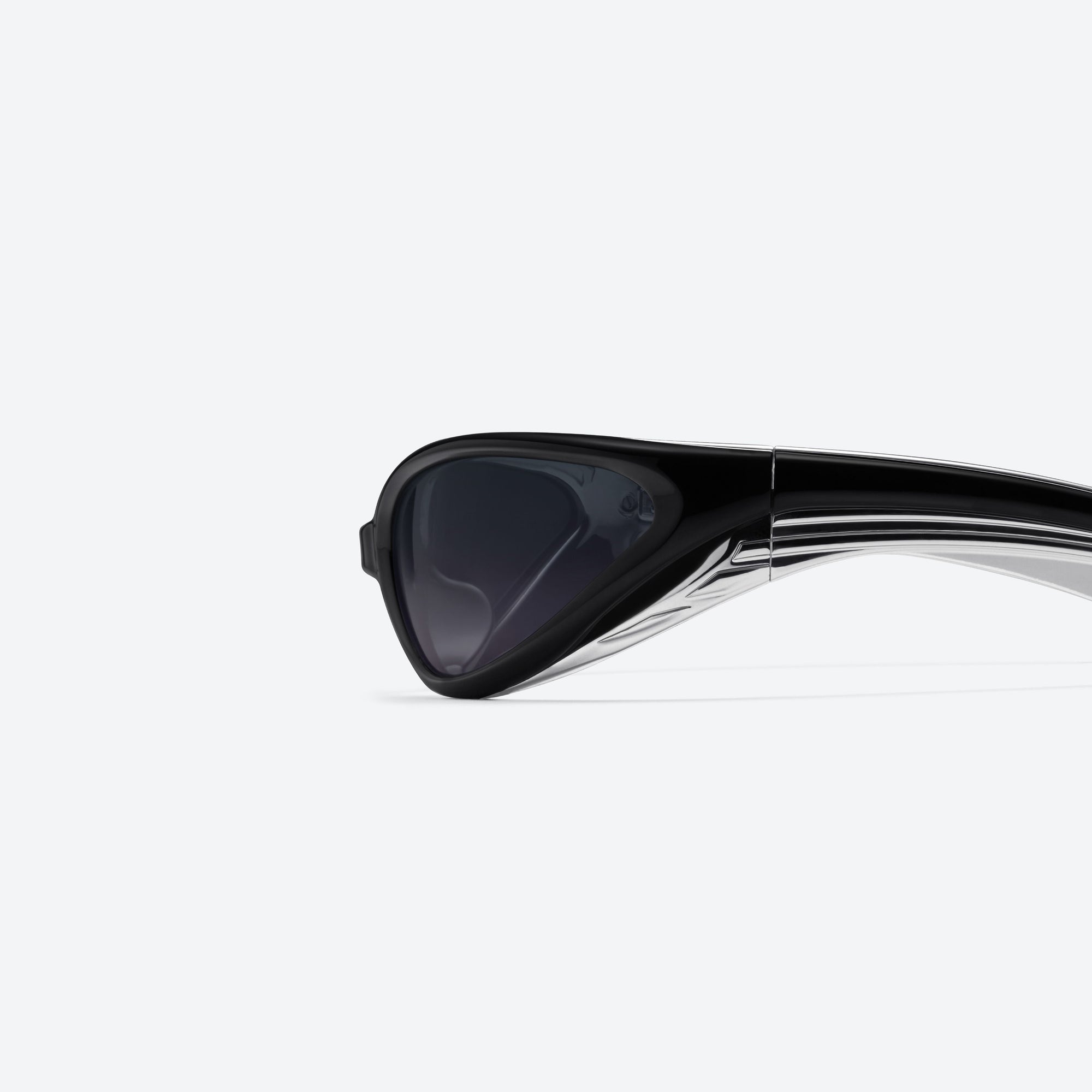 A detailed left view of Gentle Monster Apex 01 Black Nylon framed Wraparound sunglasses.