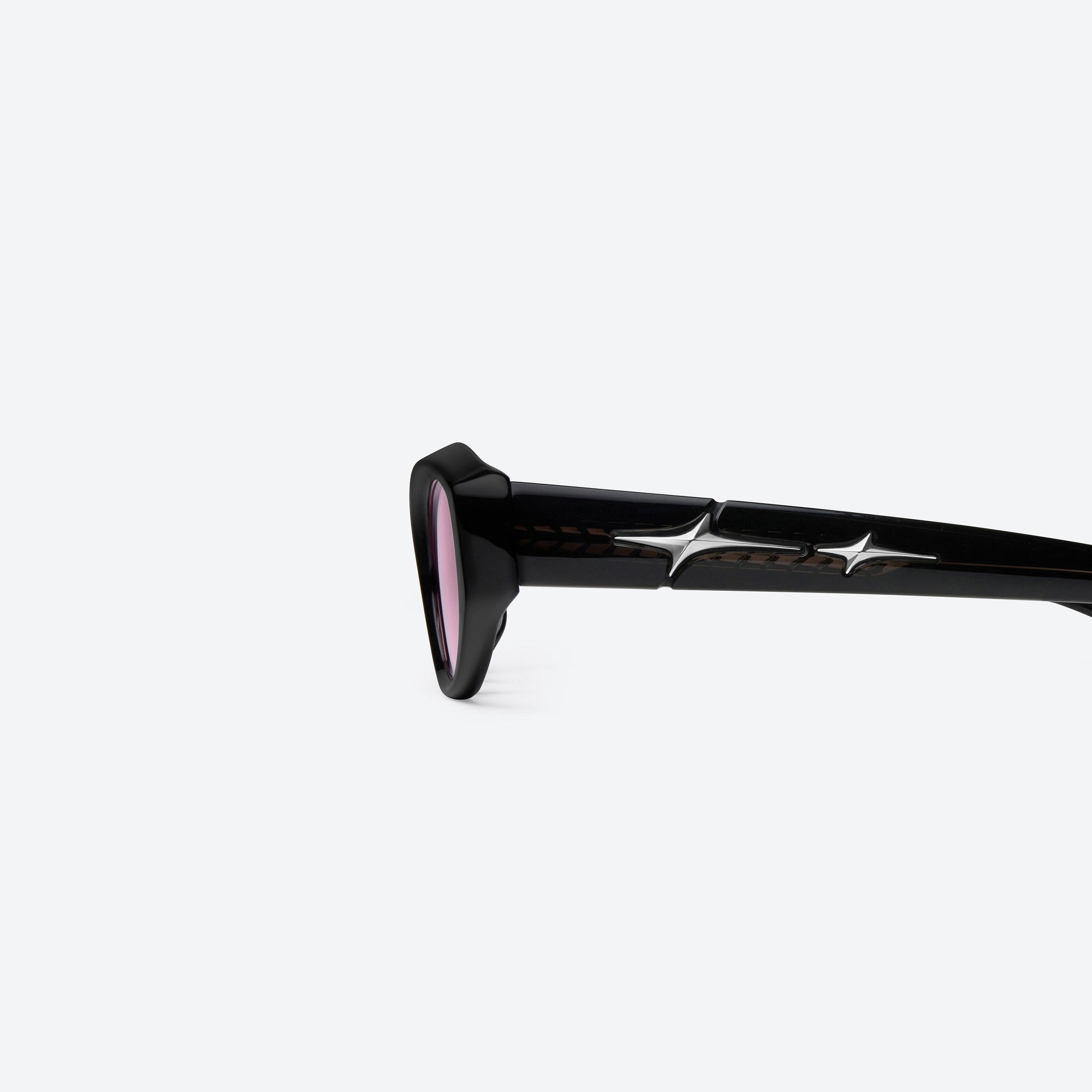 A detailed left view of Gentle Monster Synth 01 Black Acetate framed Cat-eye sunglasses.
