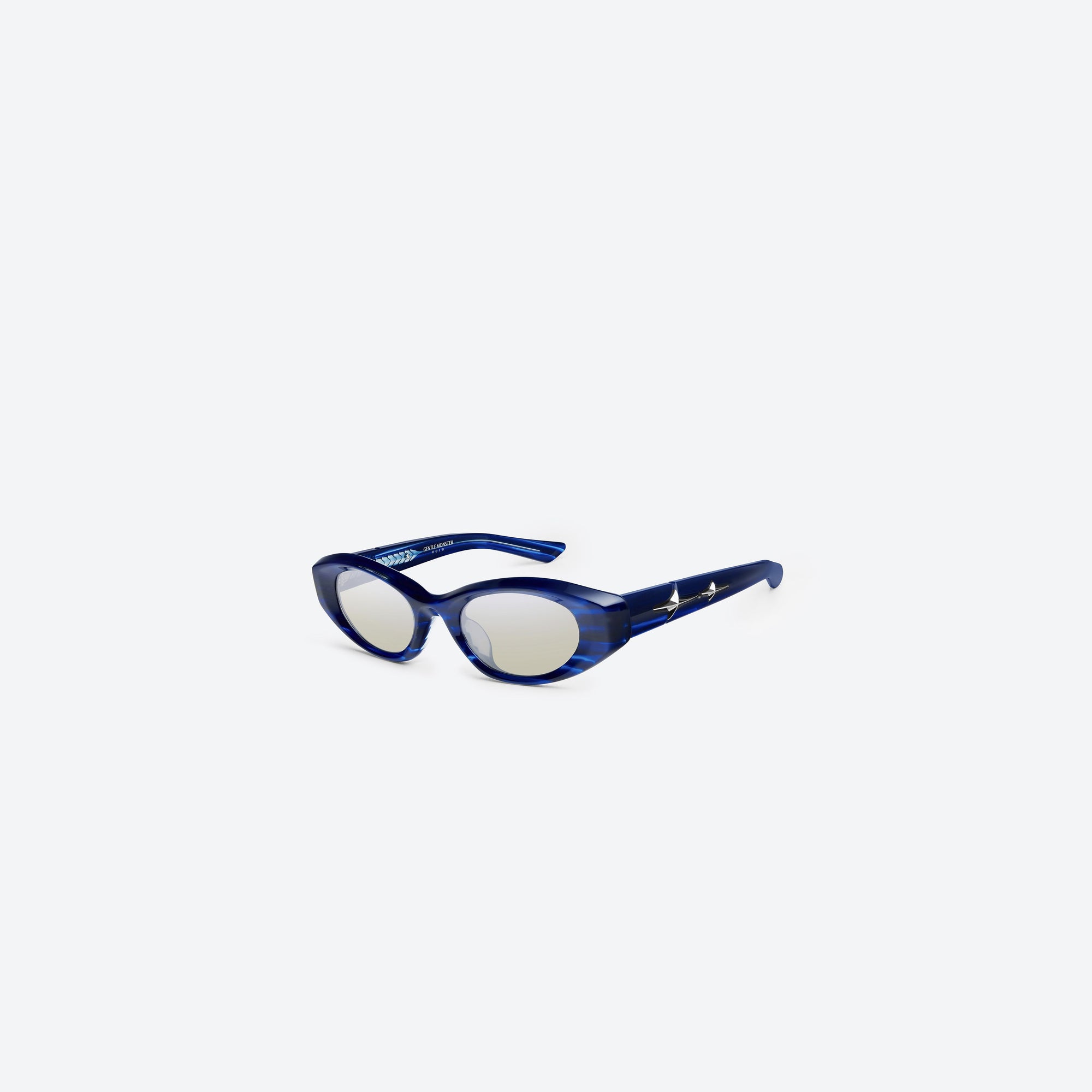 45-degree view of Gentle Monster Synth BLD1 Blue Acetate framed Cat-eye sunglasses.