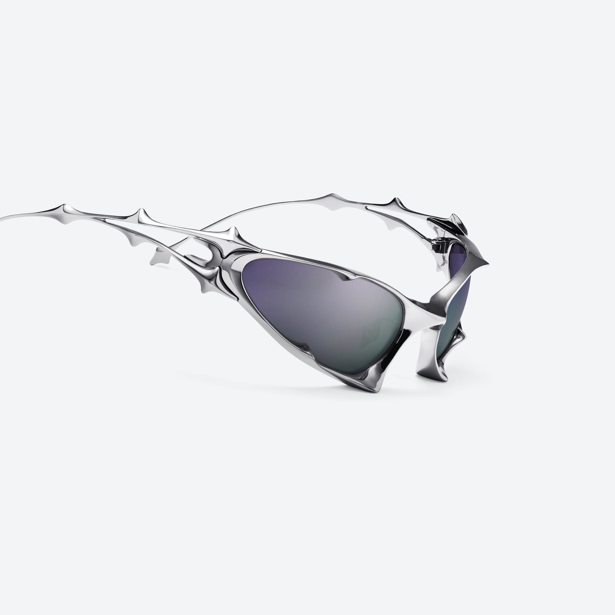 45-degree detailed view of Gentle Monster Goxx 02 Silver Metal framed Wraparound sunglasses.