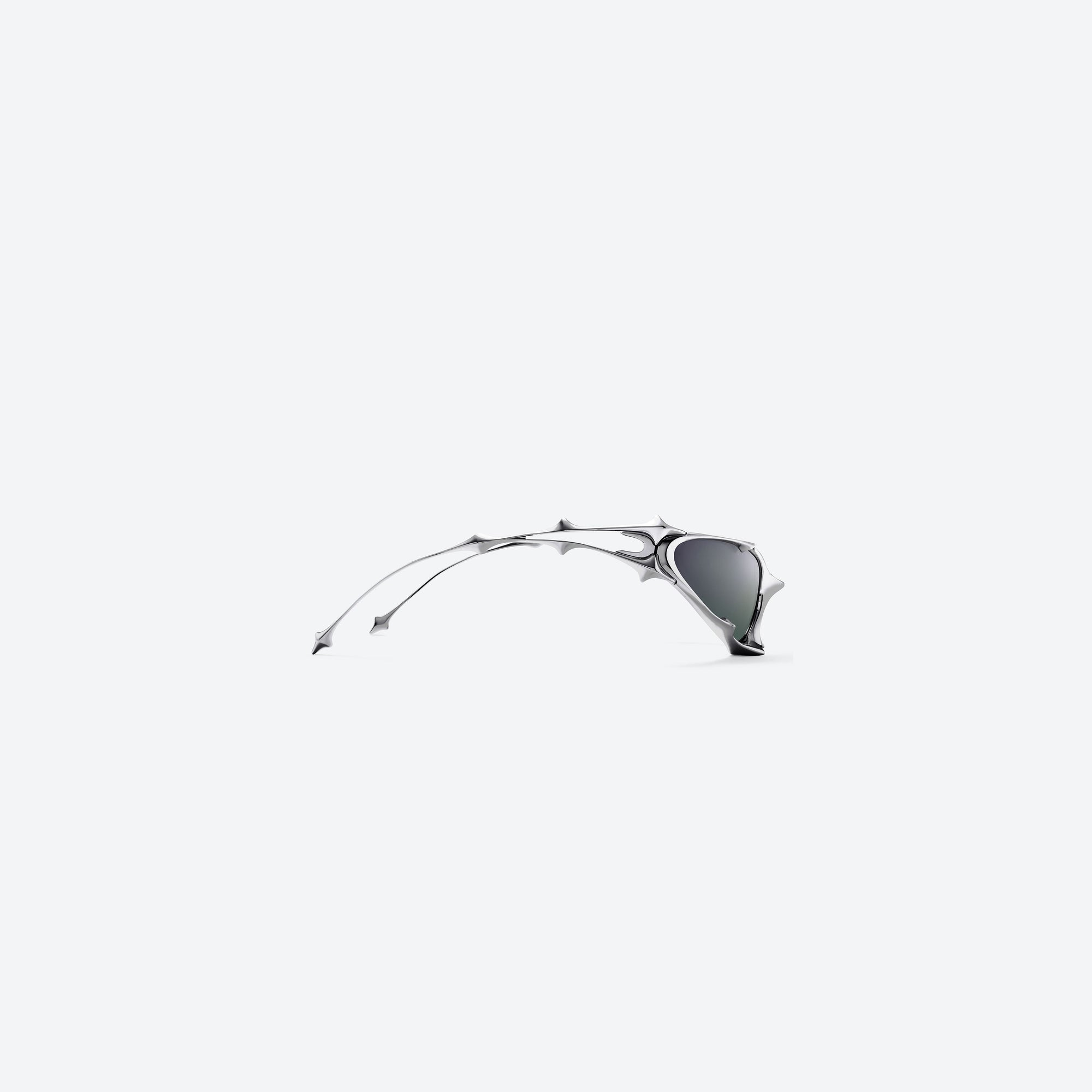 A detailed right view of Gentle Monster Goxx 02 Silver Metal framed Wraparound sunglasses.