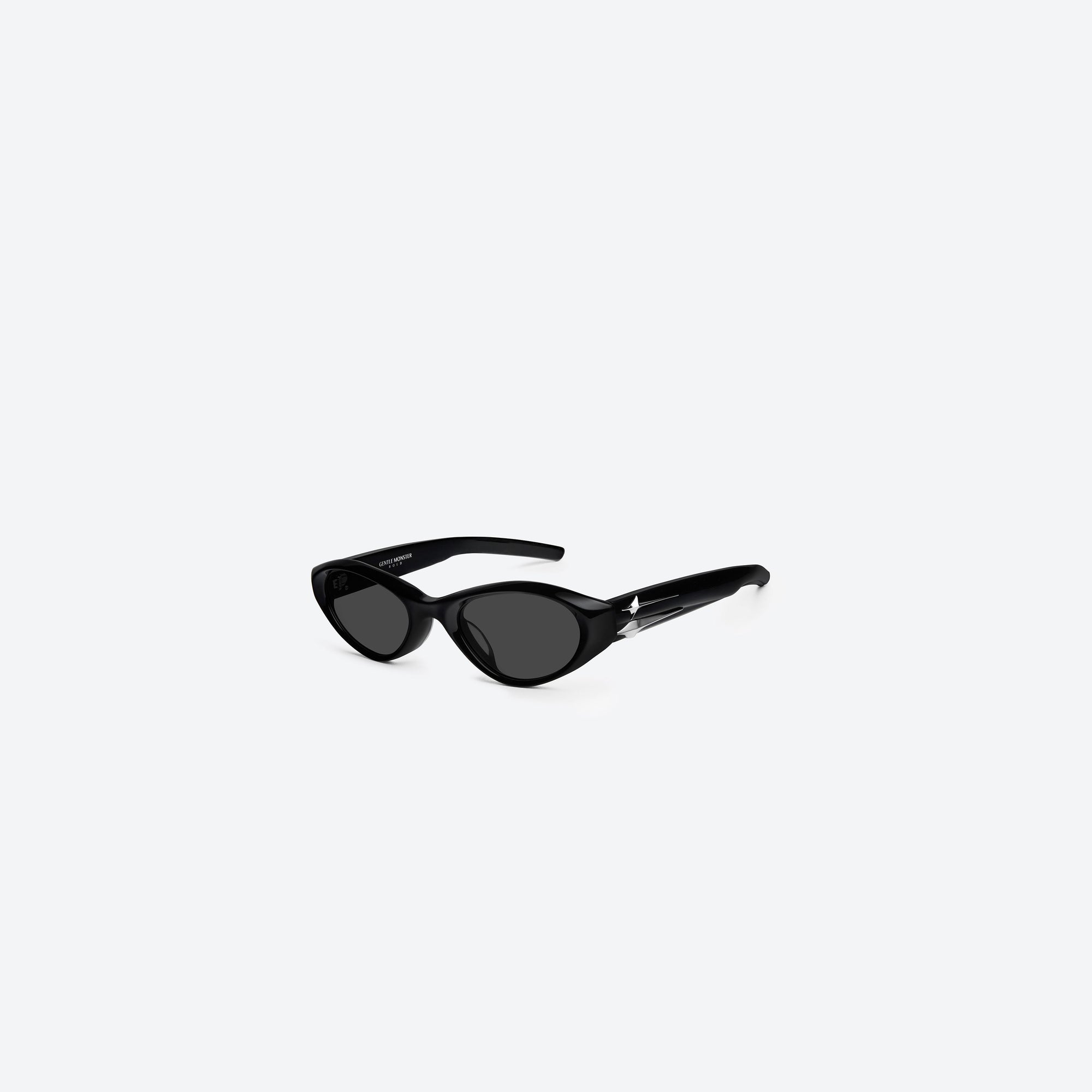 45-degree view of Gentle Monster Eq 01 Black Acetate framed Cat-eye sunglasses.