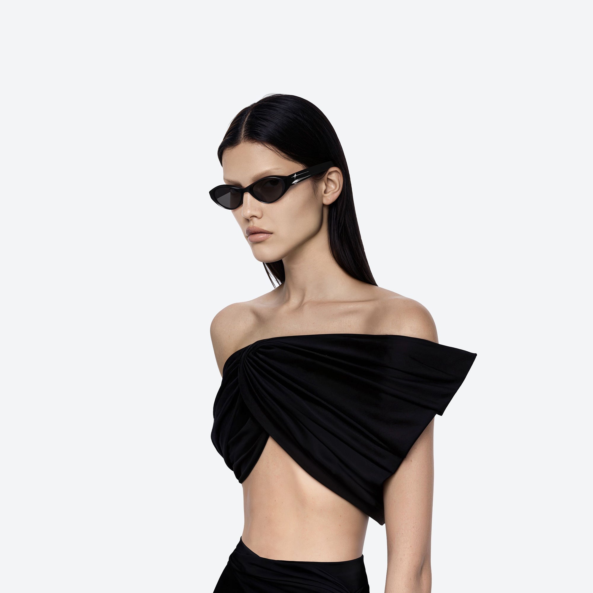 Model wearing the Eq 01 Black Acetate framed Cat-eye sunglasses.