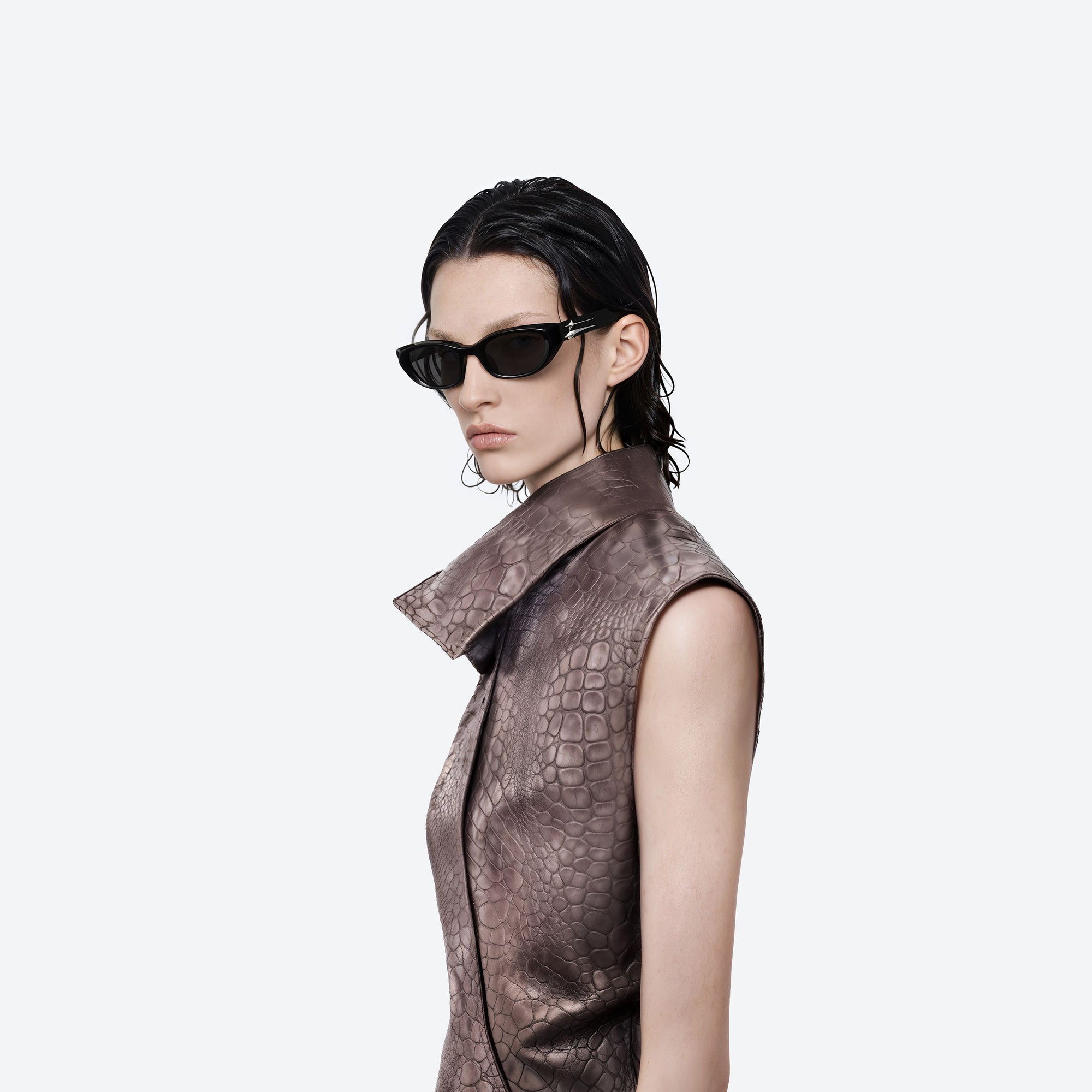 Model wearing the Verse 01 Black Acetate framed Cat-eye sunglasses.