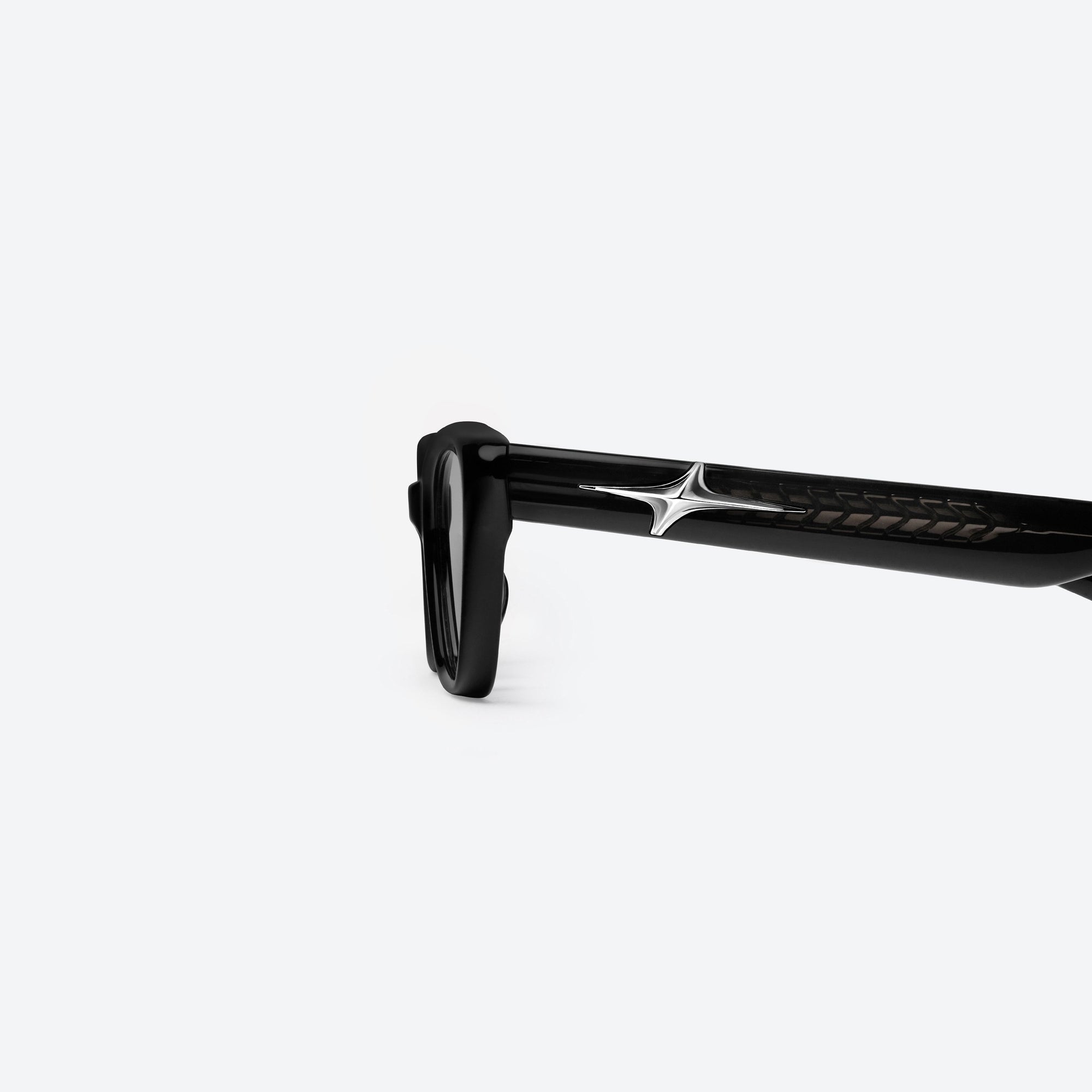 A detailed left view of Gentle Monster Mowa 01 Black Acetate framed Cat-eye sunglasses.