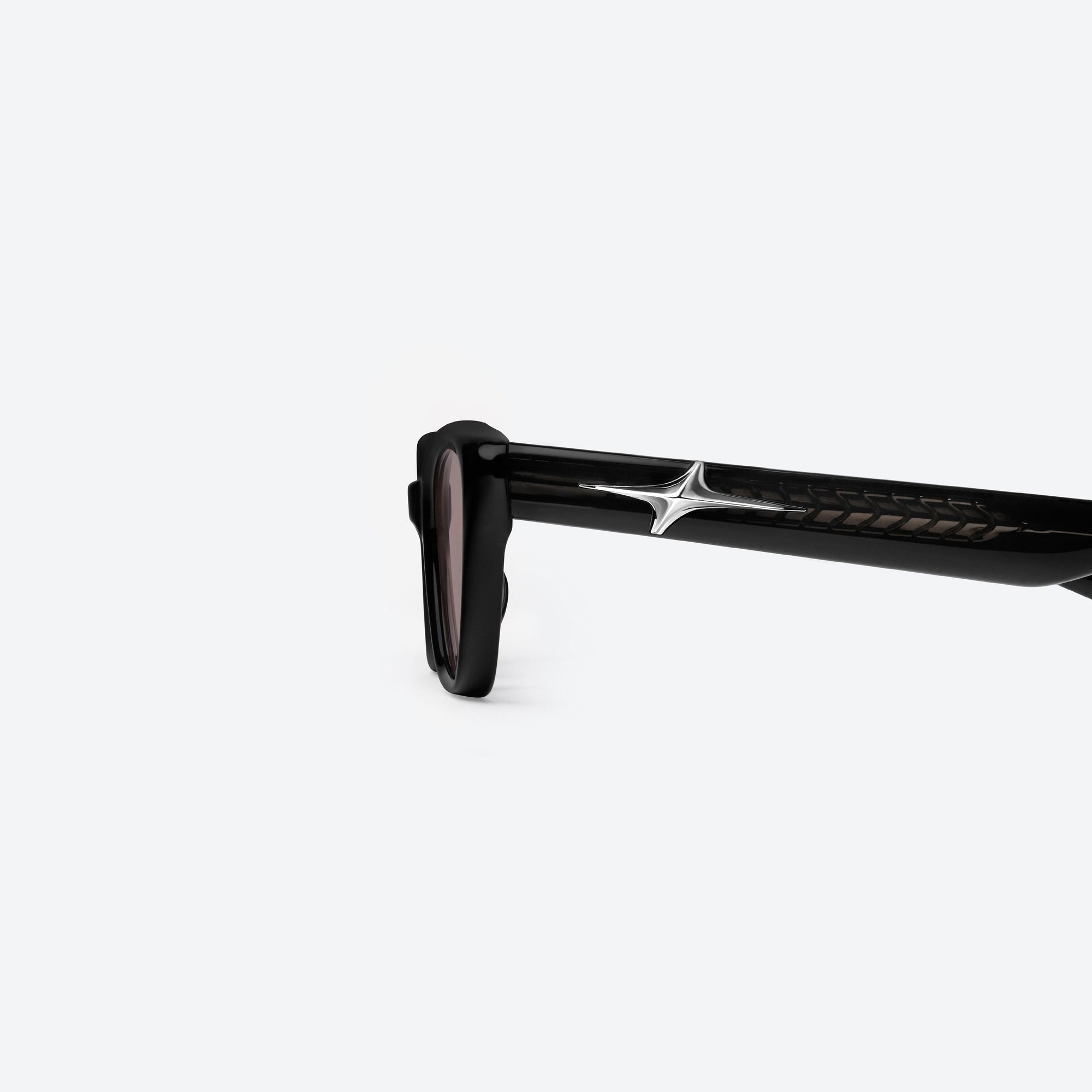 A detailed left view of Gentle Monster Mowa 01(R) Black Acetate framed Cat-eye sunglasses.