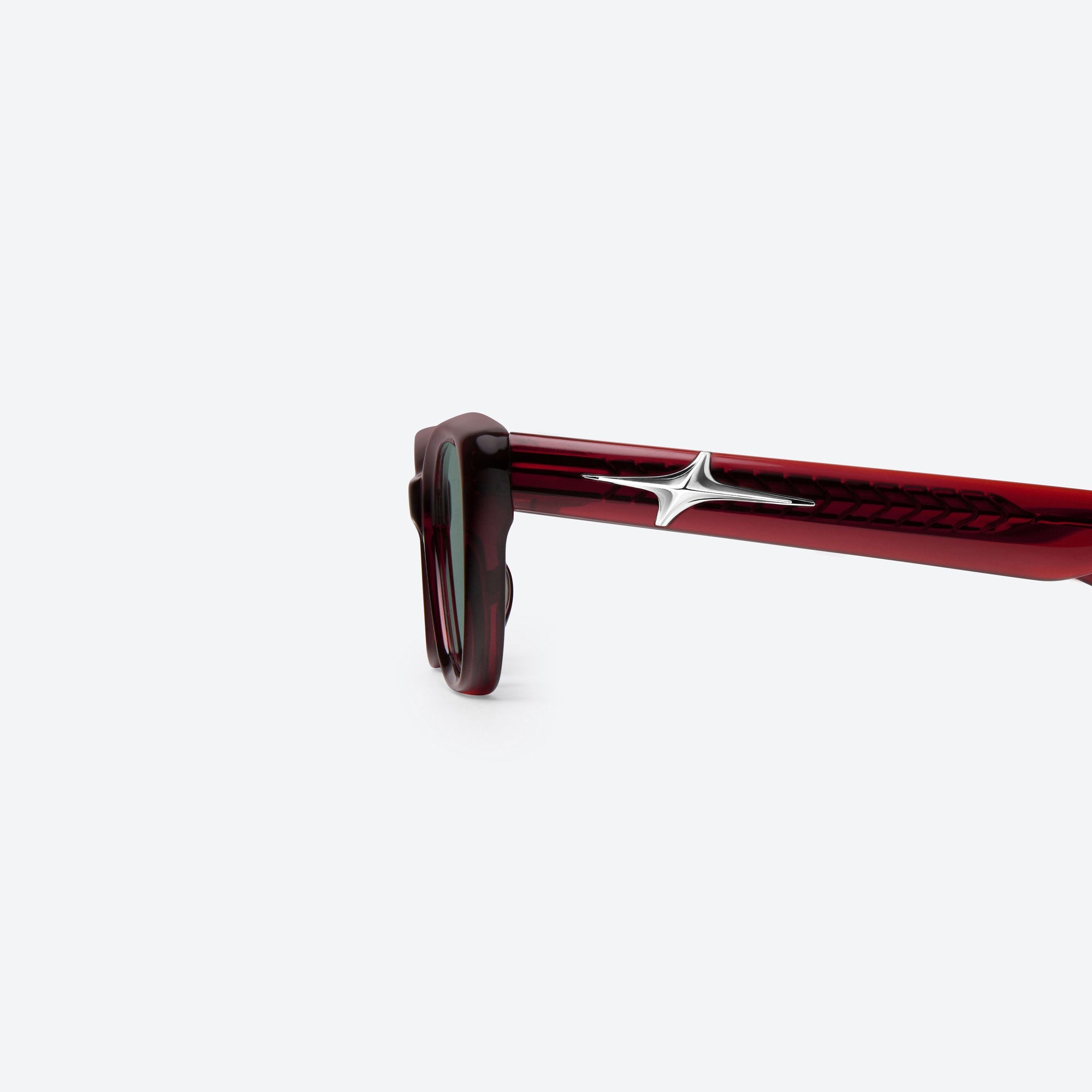 A detailed left view of Gentle Monster Mowa RC3 Red Acetate framed Cat-eye sunglasses.