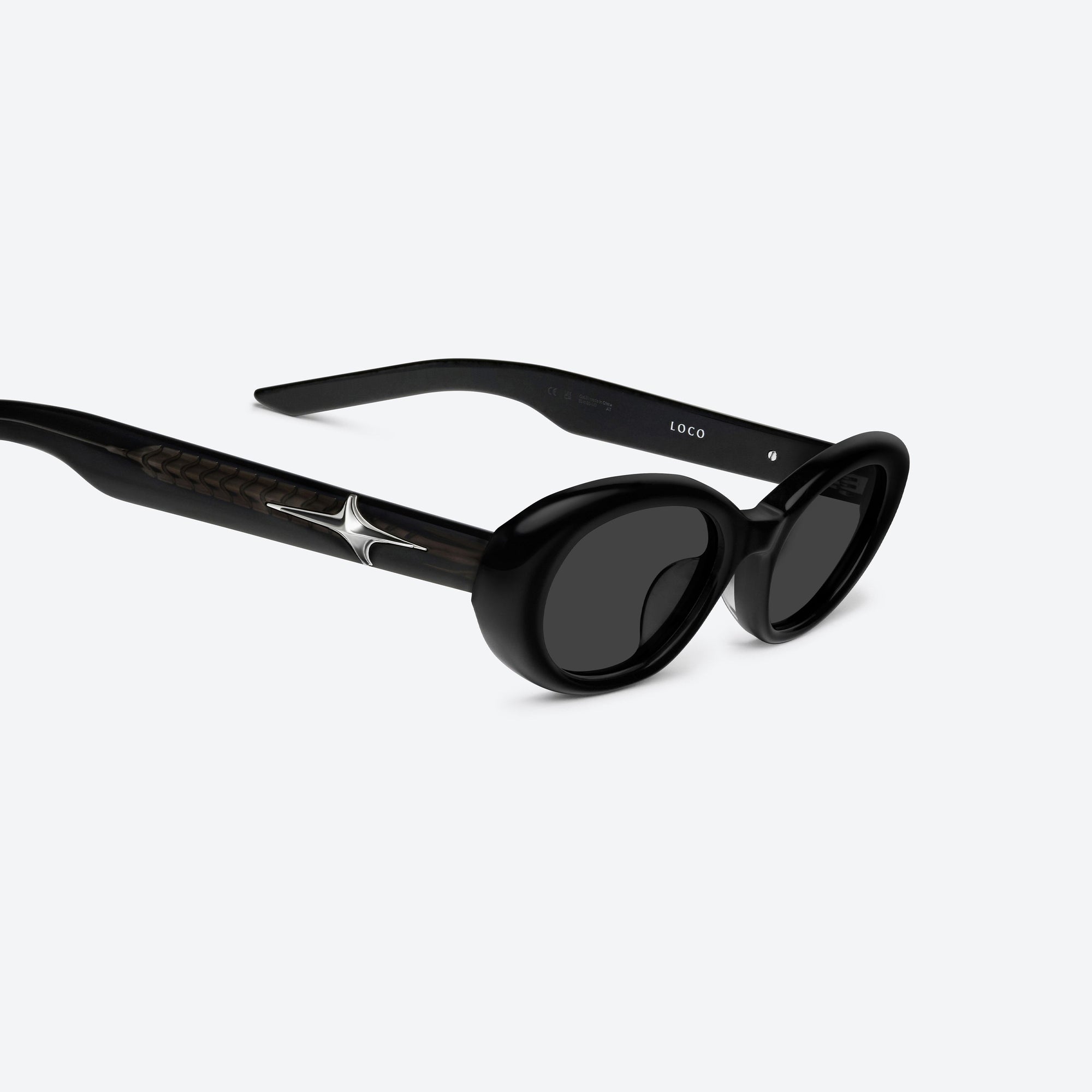45-degree detailed view of Gentle Monster Loco 01 Black Acetate framed Oval sunglasses.