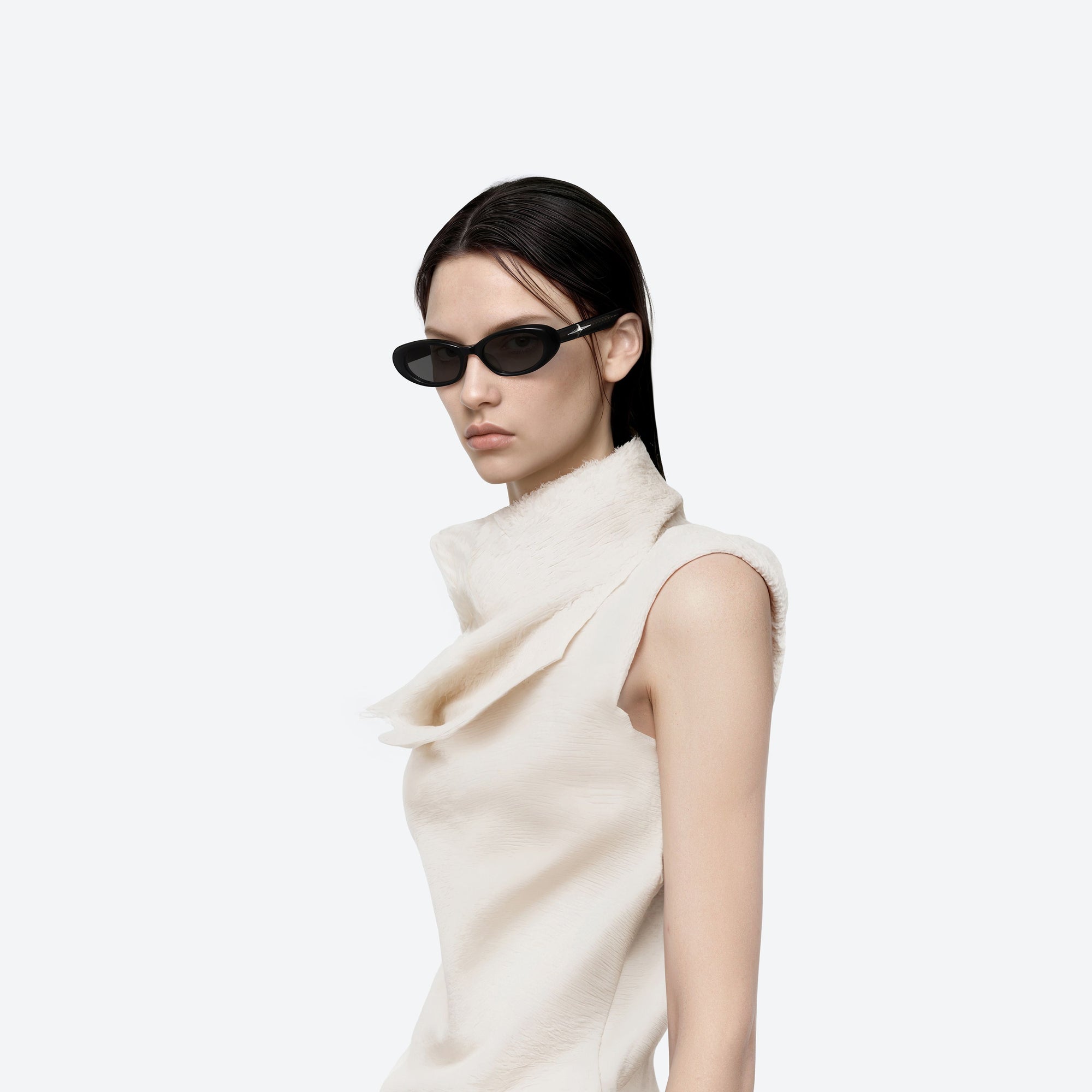 Model wearing the Loco 01 Black Acetate framed Oval sunglasses.