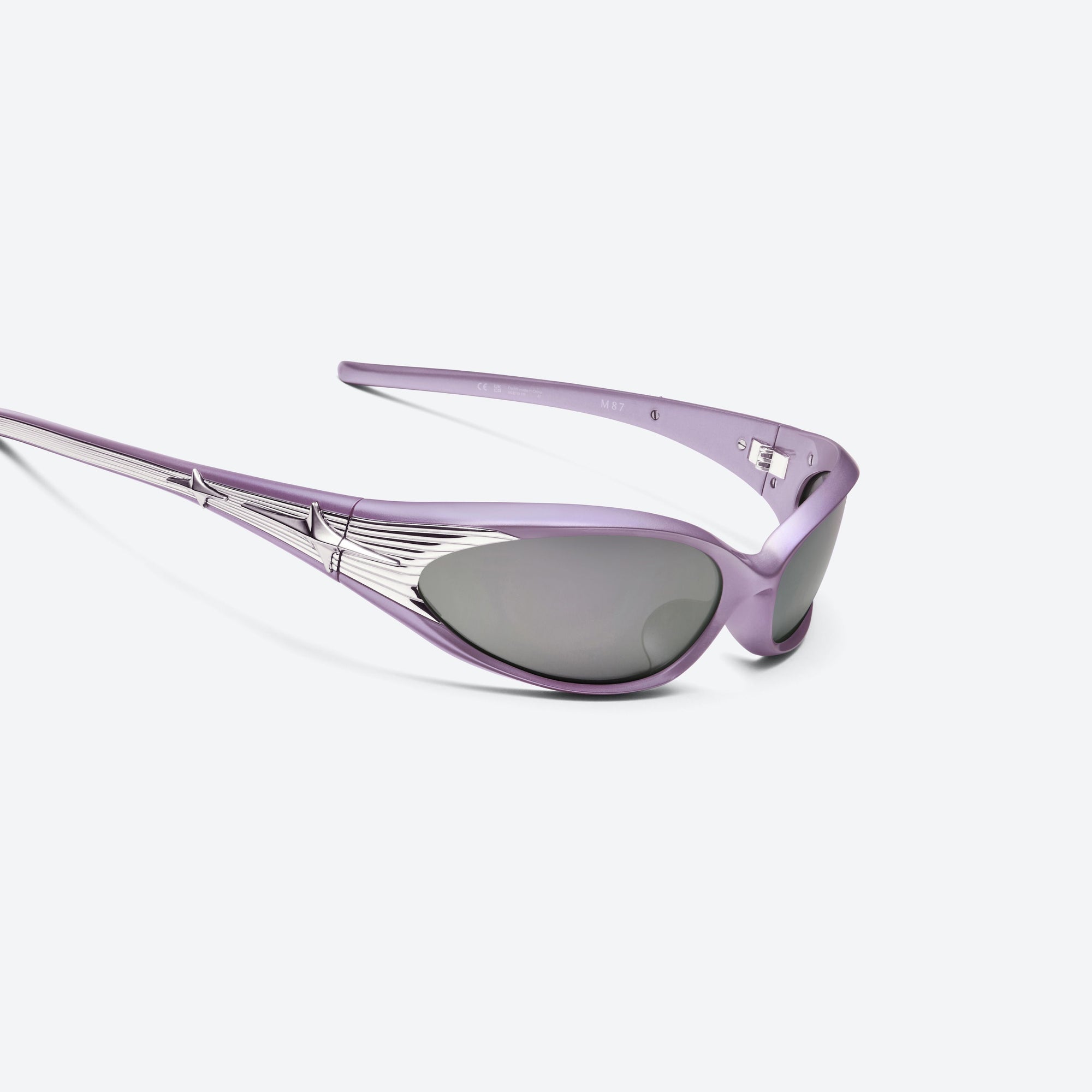 45-degree detailed view of Gentle Monster M87 V6 Purple Nylon framed Wraparound sunglasses.
