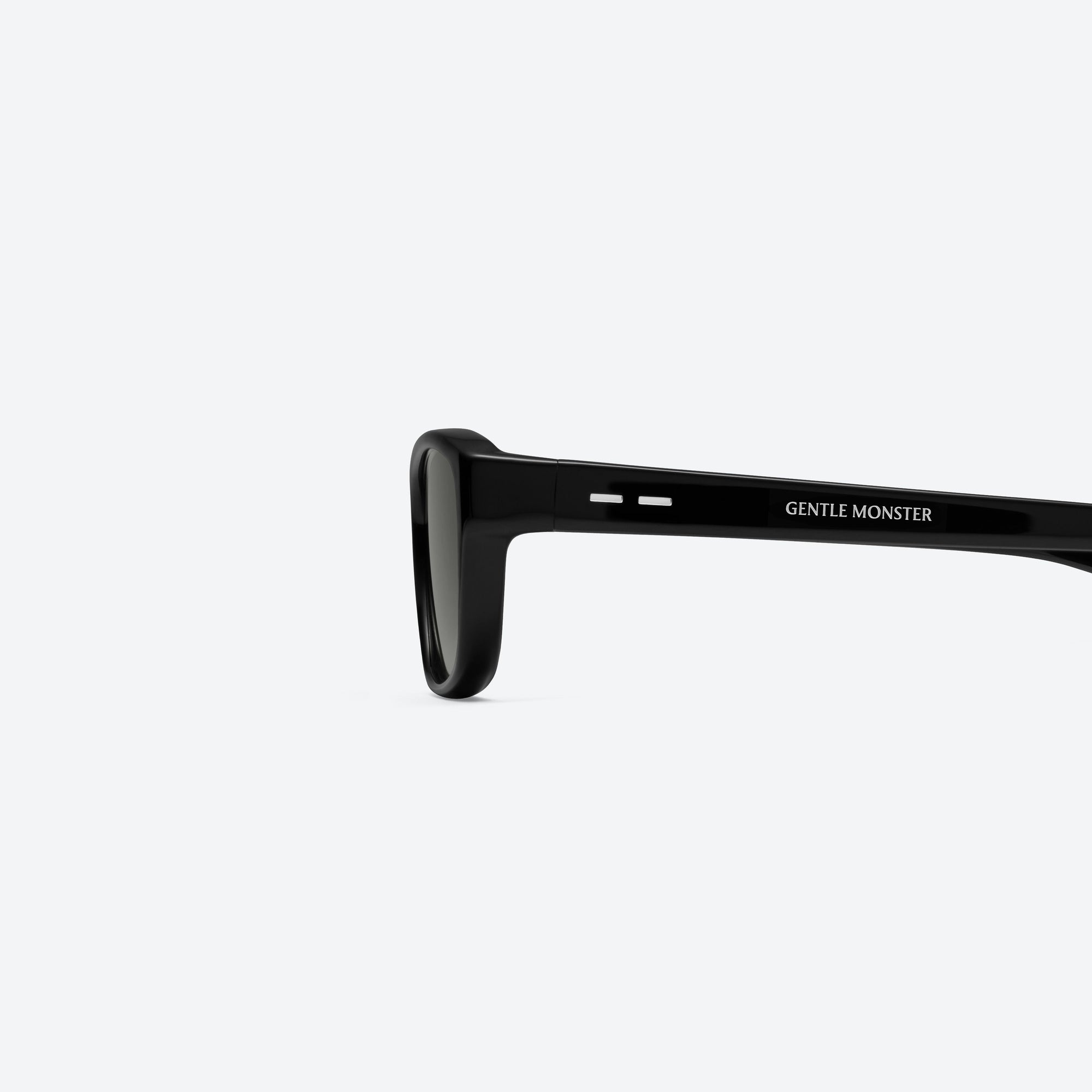A detailed left view of Gentle Monster Vety 01 Black Acetate framed Square sunglasses.