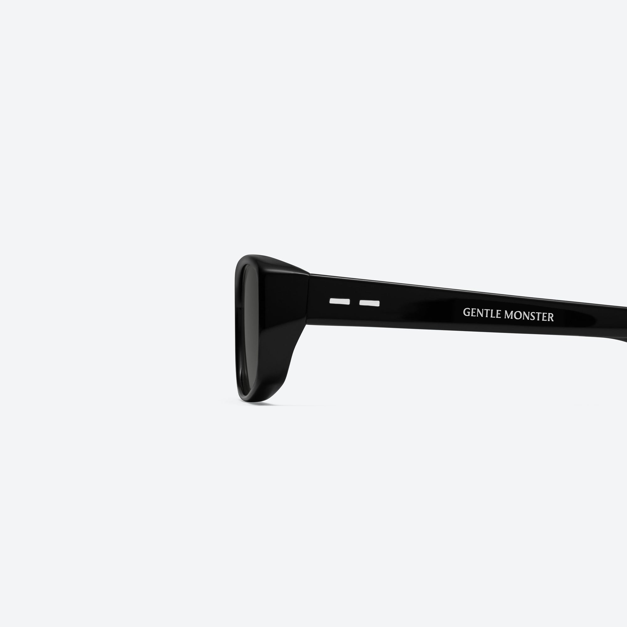 A detailed left view of Gentle Monster Noid 01 Black Acetate framed Square sunglasses.