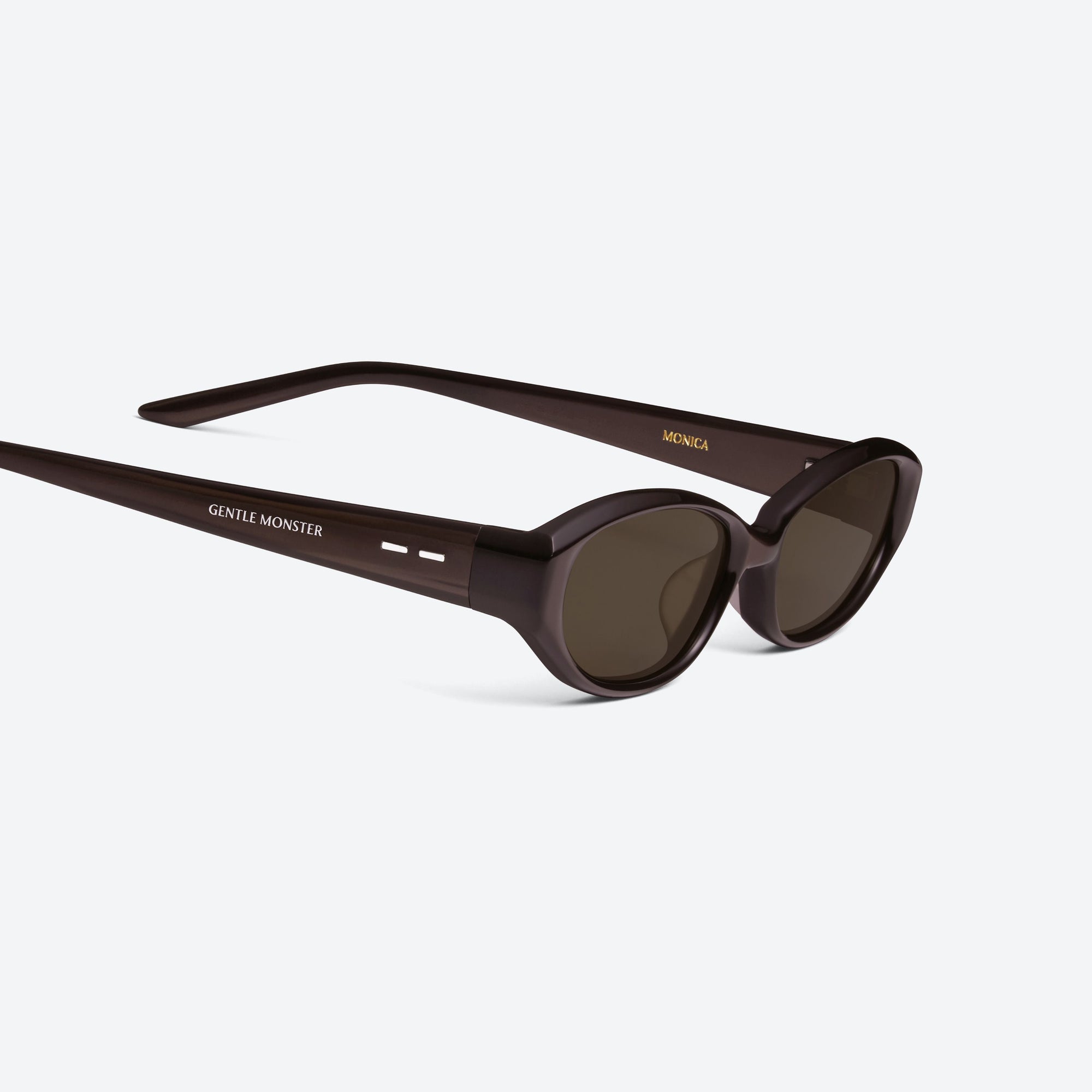 45-degree detailed view of Gentle Monster Monica R11 Red Acetate framed Cat-eye sunglasses.