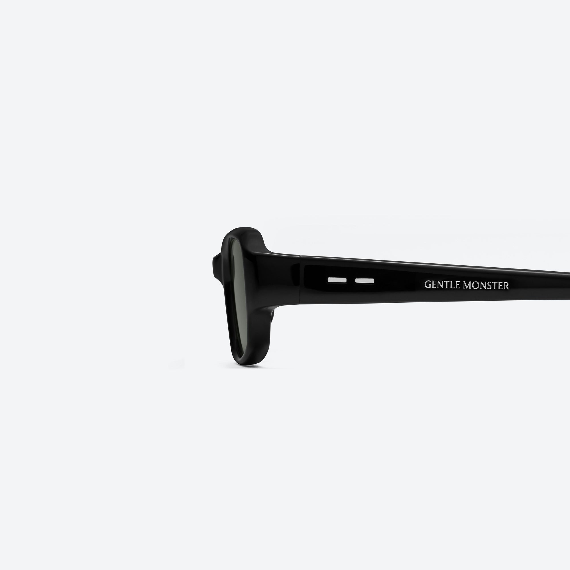 A detailed left view of Gentle Monster Halo 01 Black Acetate framed Square sunglasses.