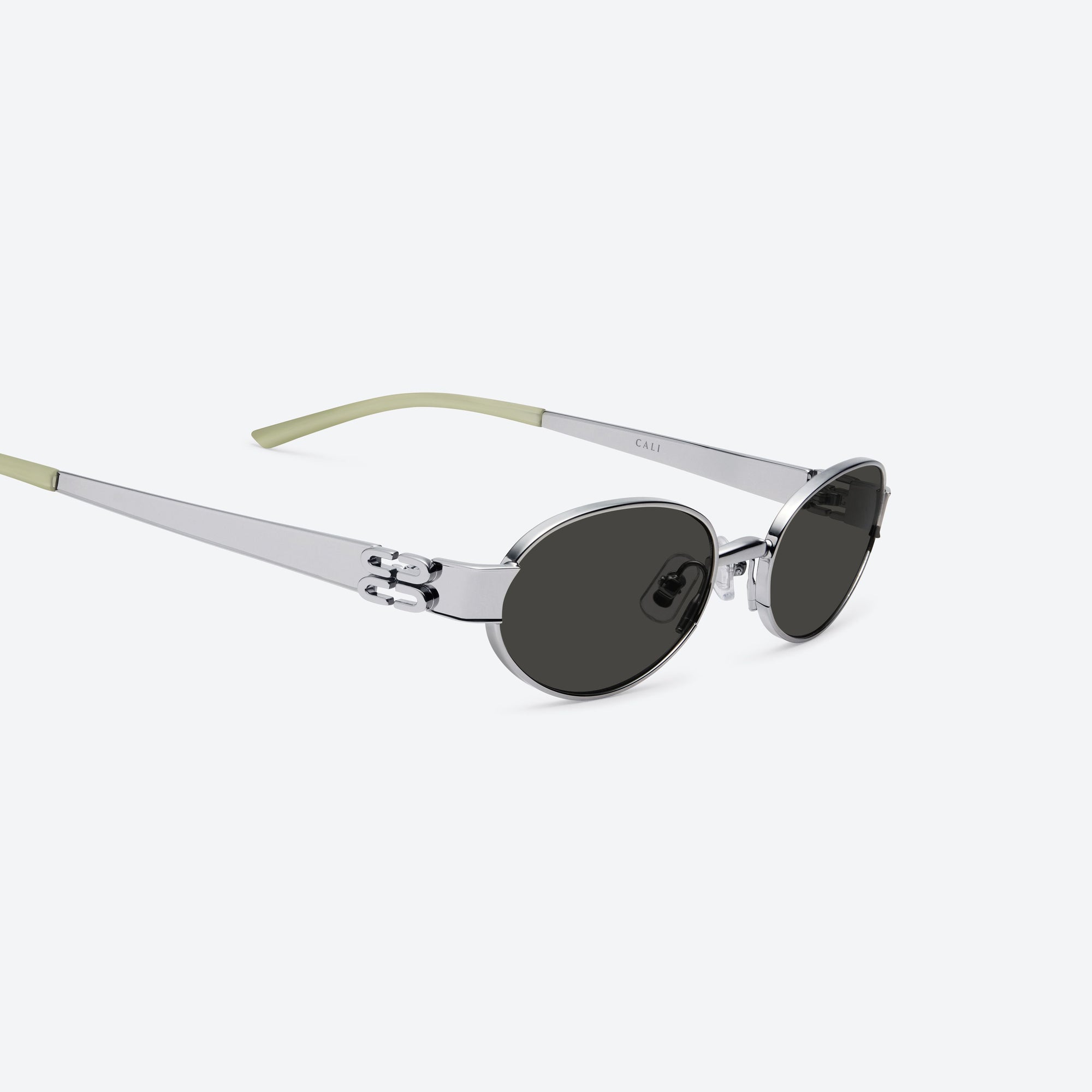 45-degree detailed view of Gentle Monster Cali 02 Silver Metal framed Oval sunglasses.